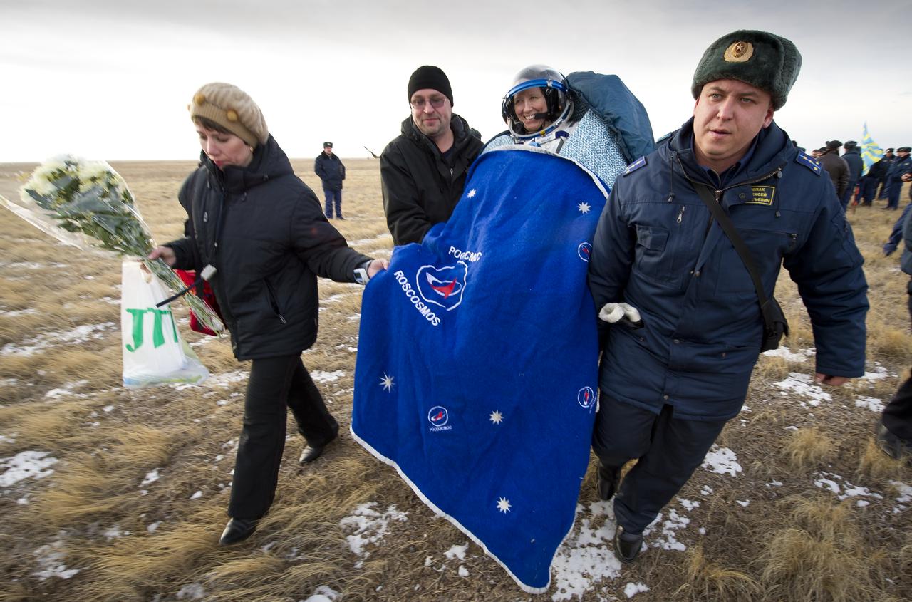 Expedition 25 Flight Engineer Shannon Walker is carried to a nearby medical tent following the landing of the Soyuz TMA-19 spacecraft near the town of Arkalyk, Kazakhstan on Friday, Nov. 26, 2010. Russian Cosmonaut Fyodor Yurchikhin and NASA Astronauts Doug Wheelock and Walker, are returning from nearly six months onboard the International Space Station where they served as members of the Expedition 24 and 25 crews. Photo Credit: (NASA/Bill Ingalls)