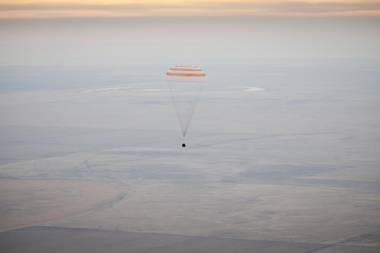 The Soyuz TMA-19 spacecraft is seen as it descends with Expedition 25 Commander Doug Wheelock and Flight Engineers Shannon Walker and Fyodor Yurchikhin near the town of Arkalyk, Kazakhstan on Friday, Nov. 26, 2010. Russian Cosmonaut Yurchikhin and NASA Astronauts Wheelock and Walker, are returning from nearly six months onboard the International Space Station where they served as members of the Expedition 24 and 25 crews. Photo Credit: (NASA/Bill Ingalls)