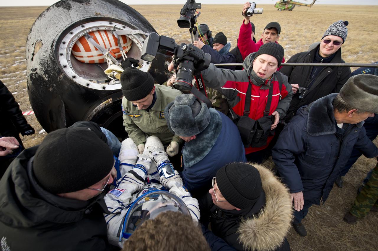 Engineer Shannon Walker out of the Soyuz TMA-19 spacecraft shortly after the capsule landed with her, Expedition 25 Commander Doug Wheelock and Flight Engineer Fyodor Yurchikhin near Arkalyk, Kazakhstan on Friday, Nov. 26, 2010. Russian Cosmonaut Yurchikhin and NASA Astronauts Wheelock and Walker, are returning from nearly six months onboard the International Space Station where they served as members of the Expedition 24 and 25 crews. Photo Credit: (NASA/Bill Ingalls)