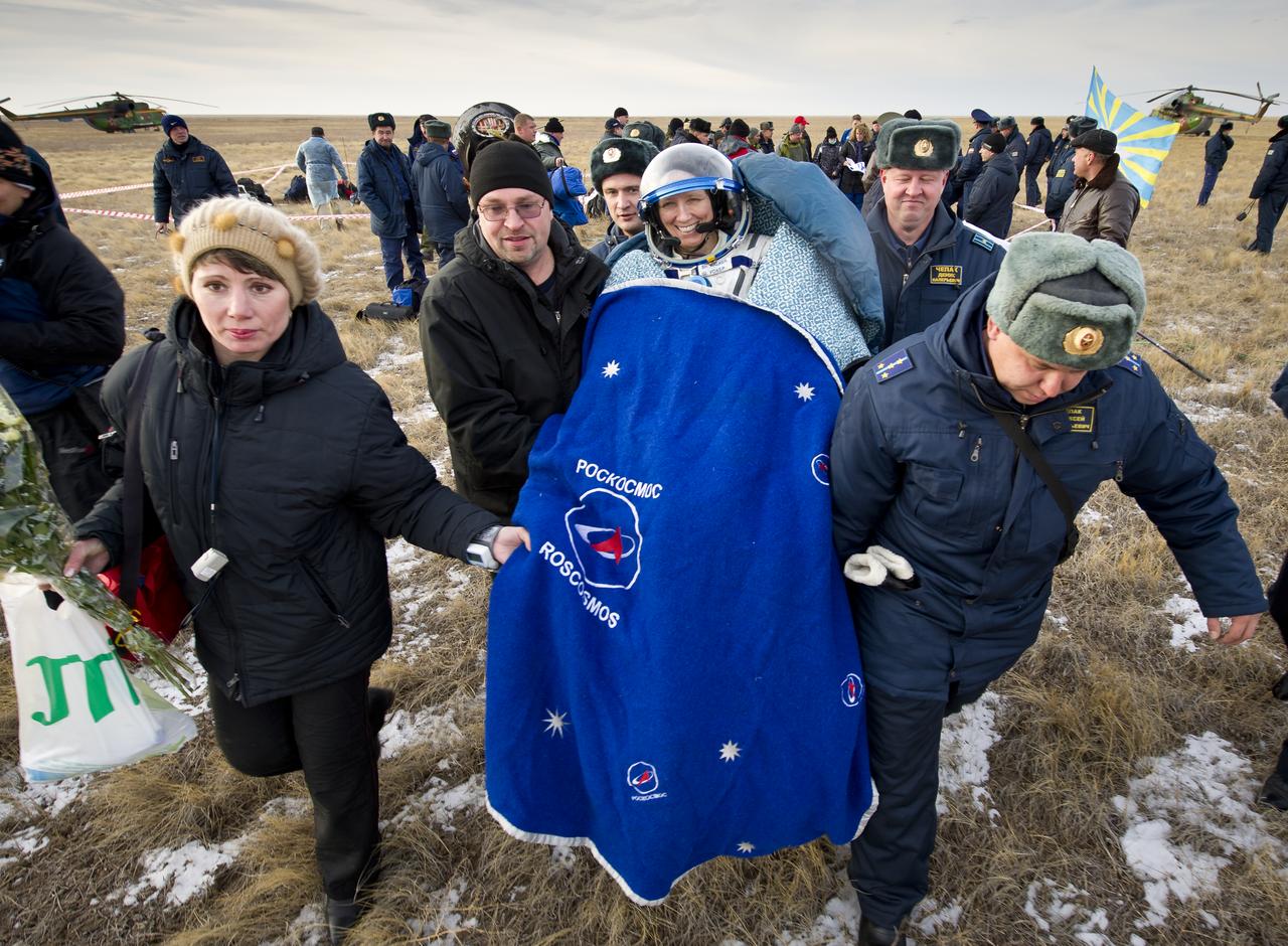 Expedition 25 Flight Engineer Shannon Walker is carried to a nearby medical tent following the landing of the Soyuz TMA-19 spacecraft near the town of Arkalyk, Kazakhstan on Friday, Nov. 26, 2010. Russian Cosmonaut Fyodor Yurchikhin and NASA Astronauts Doug Wheelock and Walker, are returning from nearly six months onboard the International Space Station where they served as members of the Expedition 24 and 25 crews. Photo Credit: (NASA/Bill Ingalls)
