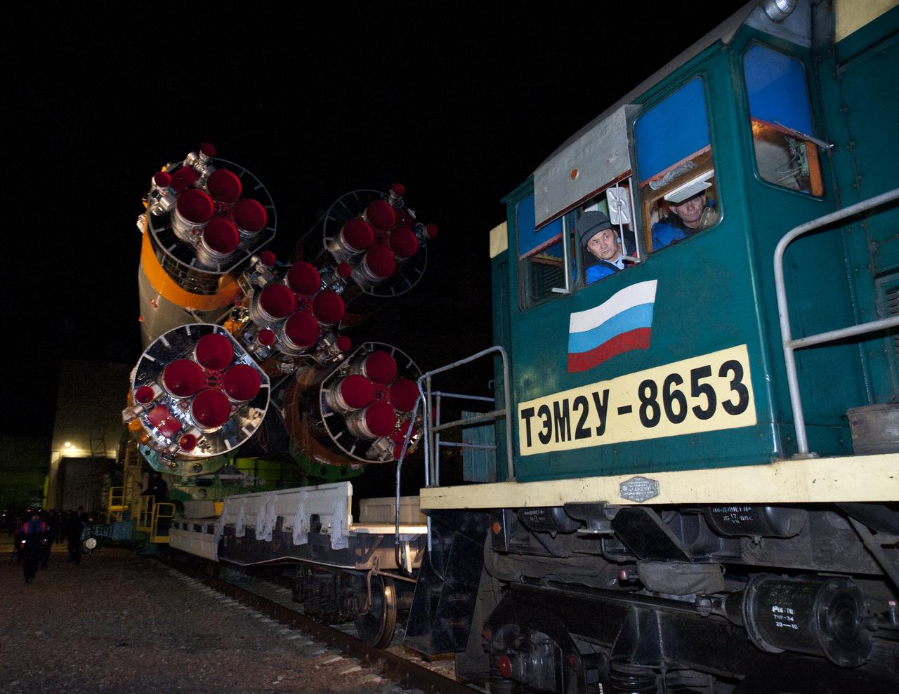 The Soyuz TMA-20 spacecraft is rolled out by train on its way to the launch pad at the Baikonur Cosmodrome, Monday, Dec. 13, 2010, in Kazakhstan.  The launch of the Soyuz spacecraft with Expedition 26 Soyuz Commander Dmitry Kondratyev, NASA Flight Engineer Catherine Coleman, and Italian astronaut Paolo Nespoli is scheduled for Thursday, Dec., 16, 2010 at 1:09 a.m. local time.  Photo Credit (NASA/Carla Cioffi)