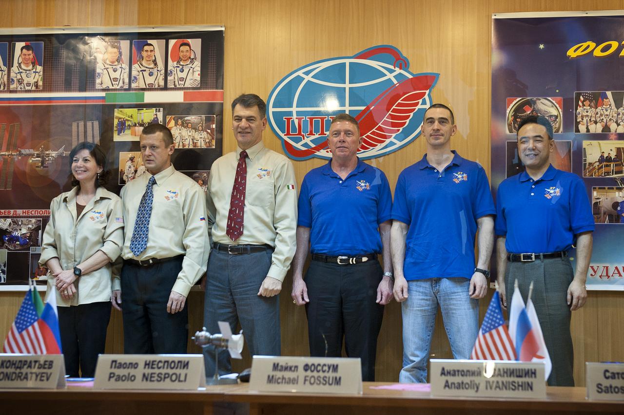 From left; Catherine Coleman, NASA Flight Engineer, Dmitry Kondratyev, Soyuz Commander, Paolo Nespoli, Italian astronaut and Flight Engineer, Michael Fossum, Expedition 26 back up crew member, Anatoly Ivanishin, Expedition 26 back up crew member and Satoshi Furukawa, Expedition 26 back up crew member are seen at the State Commission press conference held at the Cosmonaut Hotel in Baikonur, Kazakhstan on Tuesday, Dec. 14, 2010. Photo Credit: (NASA/Carla Cioffi)