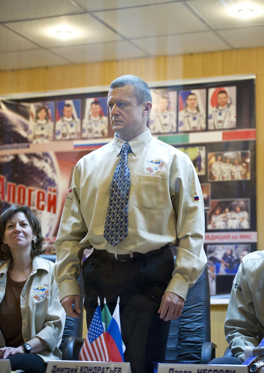 Expedition 26 Soyuz Commander Dmitry Kondratyev is seen at the State Commission press conference held at the Cosmonaut Hotel in Baikonur, Kazakhstan on Tuesday, Dec. 14, 2010. Photo Credit: (NASA/Carla Cioffi)