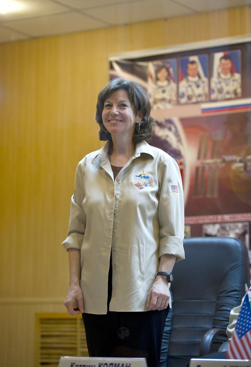 Expedition 26 Flight Engineer Catherine Coleman is seen at the State Commission press conference held at the Cosmonaut Hotel in Baikonur, Kazakhstan on Tuesday, Dec. 14, 2010. Photo Credit: (NASA/Carla Cioffi)