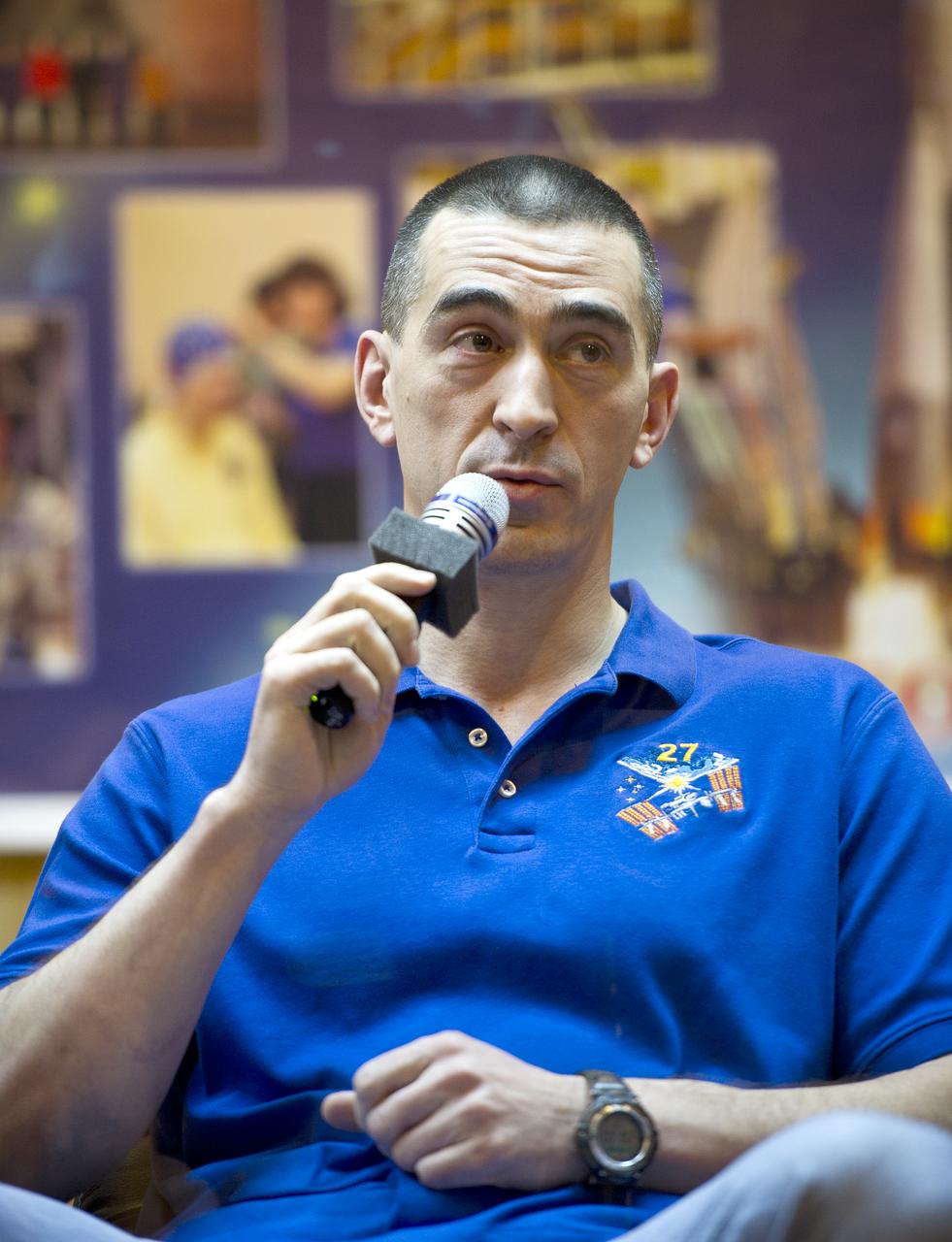 Anatoly Ivanishin, Expedition 26 back up crew member, speaks at the State Commission press conference held at the Cosmonaut Hotel in Baikonur, Kazakhstan on Tuesday, Dec. 14, 2010. Photo Credit: (NASA/Carla Cioffi)