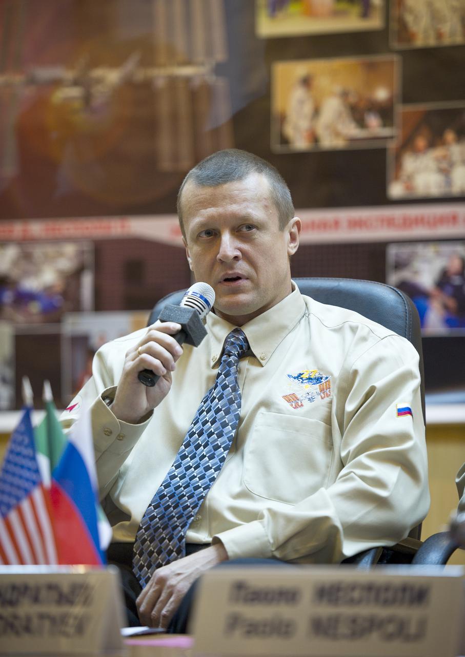 Expedition 26 Soyuz Commander Dmitry Kondratyev speaks at the State Commission press conference held at the Cosmonaut Hotel in Baikonur, Kazakhstan on Tuesday, Dec. 14, 2010. Photo Credit: (NASA/Carla Cioffi)