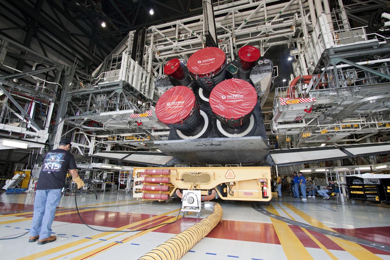 STS-135 OTS Move Underneath Orbiter Atlantis