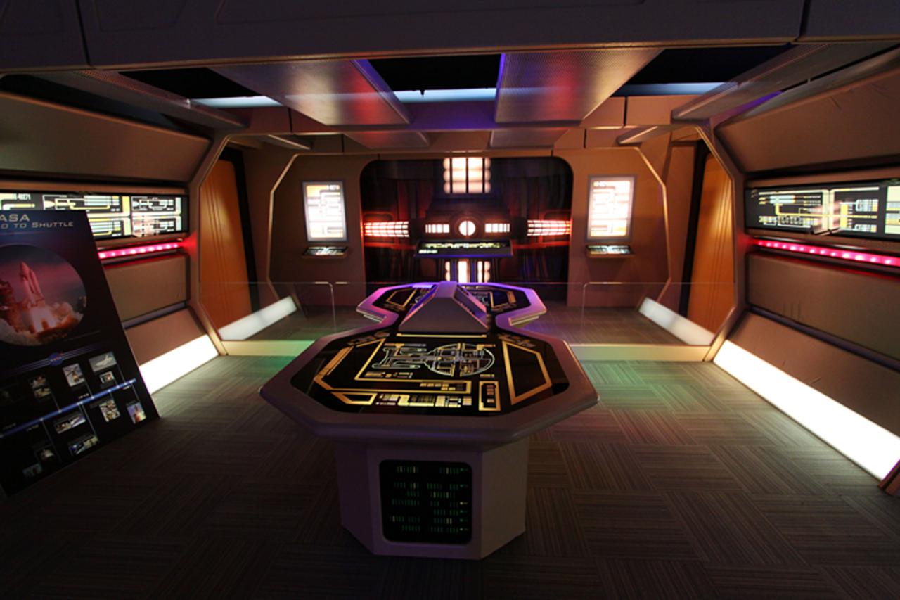 CAPE CANAVERAL, Fla. -- At NASA Kennedy Space Center's Visitor Complex, Star Trek memorabilia is being displayed this summer through Sept. 5.   Appearing for the first time in the southeast, 'Star Trek: The Exhibition' is an interactive exhibit of authentic Star Trek artifacts from the past 40 years, featuring one-of-a-kind costumes, props and filming models from every Star Trek television series and feature film, including a recreation of the U.S.S. Enterprise Bridge from the original series. Photo credit: NASA_Jack Pfaller