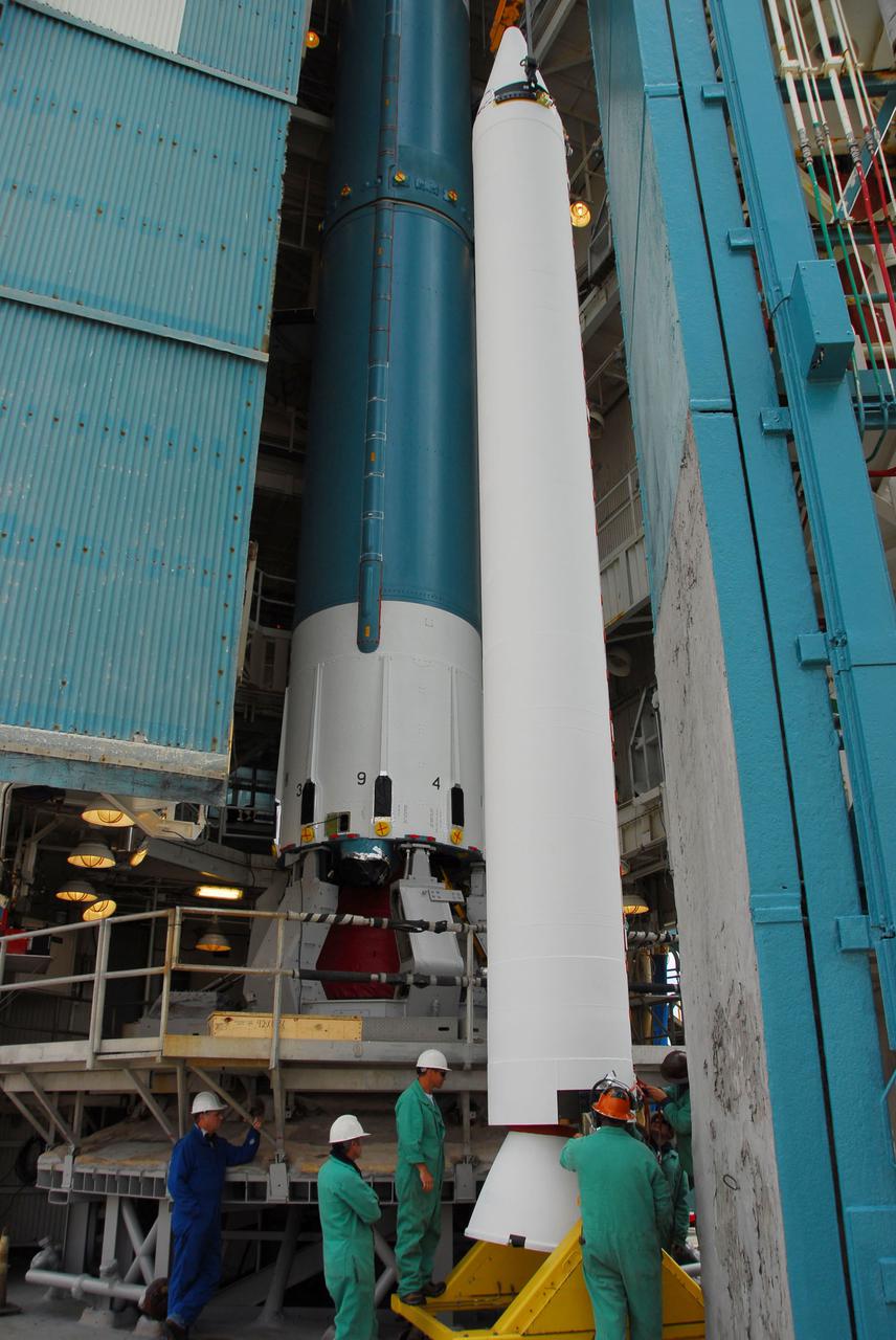 VANDENBERG AIR FORCE BASE, Calif. -- At Vandenberg Air Force Base in California, a crane is used to lift and position a solid rocket motor for attachment to the United Launch Alliance Delta II that will carry NASA's National Polar-orbiting Operational Environmental Satellite System Preparatory Project (NPP) satellite at NASA's Space Launch Complex-2. NPP represents a critical first step in building the next-generation of Earth-observing satellites. NPP will carry the first of the new sensors developed for this satellite fleet, now known as the Joint Polar Satellite System (JPSS) to be launched in 2016. NPP is the bridge between NASA's Earth Observing System (EOS) satellites and the forthcoming series of JPSS satellites. The mission will test key technologies and instruments for the JPSS missions. NPP is targeted to launch Oct. 25. For more information, visit http:__www.nasa.gov_NPP. Photo credit: NASA_VAFB, Dan Liberotti