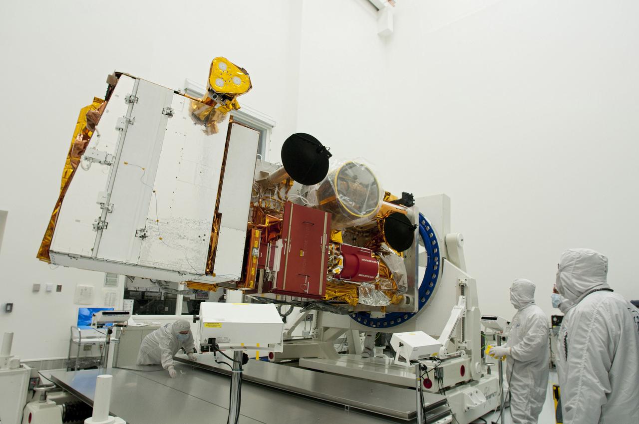 BALL AEROSPACE, Boulder, Colo. – In the Ball Aerospace and Technologies Corp. Production and Test Facility in Boulder, Colo., NASA's National Polar-orbiting Operational Environmental Satellite System Preparatory Project NPP satellite undergoes inspection by technicians after successfully completing end-to-end electromagnetic compatibility testing. A United Launch Alliance Delta II rocket will carry NPP into space.  NPP represents a critical first step in building the next-generation of Earth-observing satellites. NPP will carry the first of the new sensors developed for this satellite fleet, now known as the Joint Polar Satellite System JPSS to be launched in 2016. NPP is the bridge between NASA's Earth Observing System EOS satellites and the forthcoming series of JPSS satellites. The mission will test key technologies and instruments for the JPSS missions. NPP is targeted to launch Oct. 27. For more information, visit http:__www.nasa.gov_NPP. Photo credit: Ball Aerospace