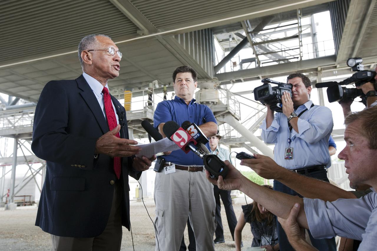 CAPE CANAVERAL, Fla. – At Kennedy Space Center in Florida, NASA Administrator Charlie Bolden talks to media underneath NASA’s mobile launcher (ML) support structure. Center Director Bob Cabana also attended the media event held to detail ML’s use with NASA’s Space Launch System (SLS) heavy-lift rocket, which will take astronauts into deep space on missions to asteroids, the moon or Mars.    It took about two years to construct the 355-foot-tall ML structure, which will support NASA's future human spaceflight program. The ML can be outfitted with ground support equipment, such as umbilicals and access arms, for future rocket launches. Photo credit: NASA_Dimitri Gerondidakis