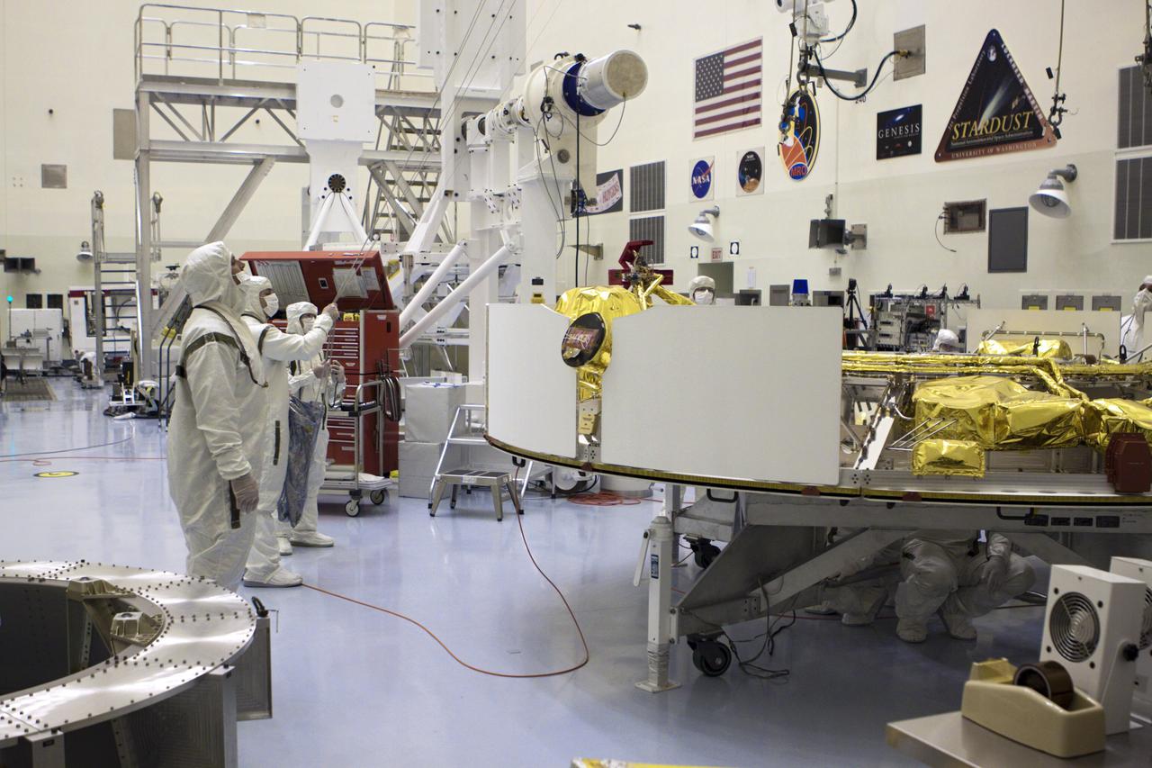 CAPE CANAVERAL, Fla. – In the Payload Hazardous Servicing Facility at NASA’s Kennedy Space Center in Florida, technicians prepare to attach an overhead crane to NASA's Mars Science Laboratory (MSL) mission cruise stage. The cruise stage, which will be lifted onto a rotation stand, provides solar power, thrusters for navigation, and heat exchangers to the rover during its flight from Earth to Mars. MSL's components include a car-sized rover, Curiosity, which has 10 science instruments designed to search for evidence on whether Mars has had environments favorable to microbial life, including chemical ingredients for life. The unique rover will use a laser to look inside rocks and release its gasses so that the rover’s spectrometer can analyze and send the data back to Earth. Launch of MSL aboard a United Launch Alliance Atlas V rocket is scheduled for Nov. 25 from Space Launch Complex 41 on Cape Canaveral Air Force Station in Florida. For more information, visit http:__www.nasa.gov_msl. Photo credit: NASA_Glenn Benson