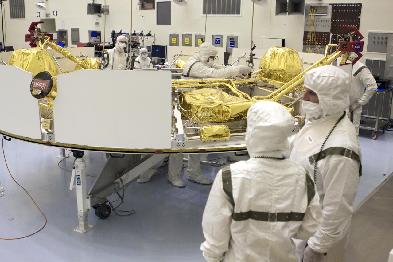 CAPE CANAVERAL, Fla. – In the Payload Hazardous Servicing Facility at NASA’s Kennedy Space Center in Florida, technicians prepare to attach an overhead crane to NASA's Mars Science Laboratory (MSL) mission cruise stage. The cruise stage, which will be lifted onto a rotation stand, provides solar power, thrusters for navigation, and heat exchangers to the rover during its flight from Earth to Mars. MSL's components include a car-sized rover, Curiosity, which has 10 science instruments designed to search for evidence on whether Mars has had environments favorable to microbial life, including chemical ingredients for life. The unique rover will use a laser to look inside rocks and release its gasses so that the rover’s spectrometer can analyze and send the data back to Earth. Launch of MSL aboard a United Launch Alliance Atlas V rocket is scheduled for Nov. 25 from Space Launch Complex 41 on Cape Canaveral Air Force Station in Florida. For more information, visit http:__www.nasa.gov_msl. Photo credit: NASA_Glenn Benson