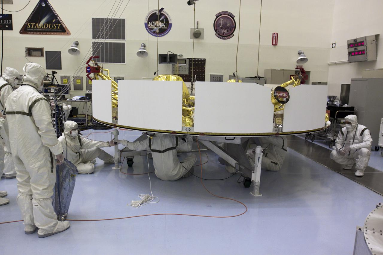 CAPE CANAVERAL, Fla. – In the Payload Hazardous Servicing Facility at NASA’s Kennedy Space Center in Florida, technicians attach an overhead crane to NASA's Mars Science Laboratory (MSL) mission cruise stage. The cruise stage, which will be lifted onto a rotation stand, provides solar power, thrusters for navigation, and heat exchangers to the rover during its flight from Earth to Mars. MSL's components include a car-sized rover, Curiosity, which has 10 science instruments designed to search for evidence on whether Mars has had environments favorable to microbial life, including chemical ingredients for life. The unique rover will use a laser to look inside rocks and release its gasses so that the rover’s spectrometer can analyze and send the data back to Earth. Launch of MSL aboard a United Launch Alliance Atlas V rocket is scheduled for Nov. 25 from Space Launch Complex 41 on Cape Canaveral Air Force Station in Florida. For more information, visit http:__www.nasa.gov_msl. Photo credit: NASA_Glenn Benson