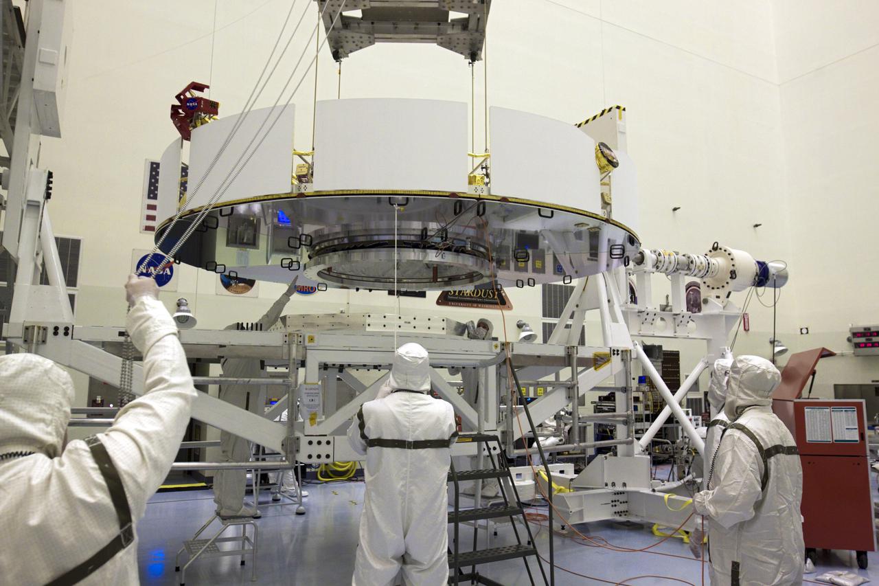 CAPE CANAVERAL, Fla. – In the Payload Hazardous Servicing Facility at NASA’s Kennedy Space Center in Florida, technicians, using an overhead crane, lower NASA's Mars Science Laboratory (MSL) mission cruise stage onto a rotation stand. The cruise stage provides solar power, thrusters for navigation, and heat exchangers to the rover during its flight from Earth to Mars. MSL's components include a car-sized rover, Curiosity, which has 10 science instruments designed to search for evidence on whether Mars has had environments favorable to microbial life, including chemical ingredients for life. The unique rover will use a laser to look inside rocks and release its gasses so that the rover’s spectrometer can analyze and send the data back to Earth. Launch of MSL aboard a United Launch Alliance Atlas V rocket is scheduled for Nov. 25 from Space Launch Complex 41 on Cape Canaveral Air Force Station in Florida. For more information, visit http:__www.nasa.gov_msl. Photo credit: NASA_Glenn Benson