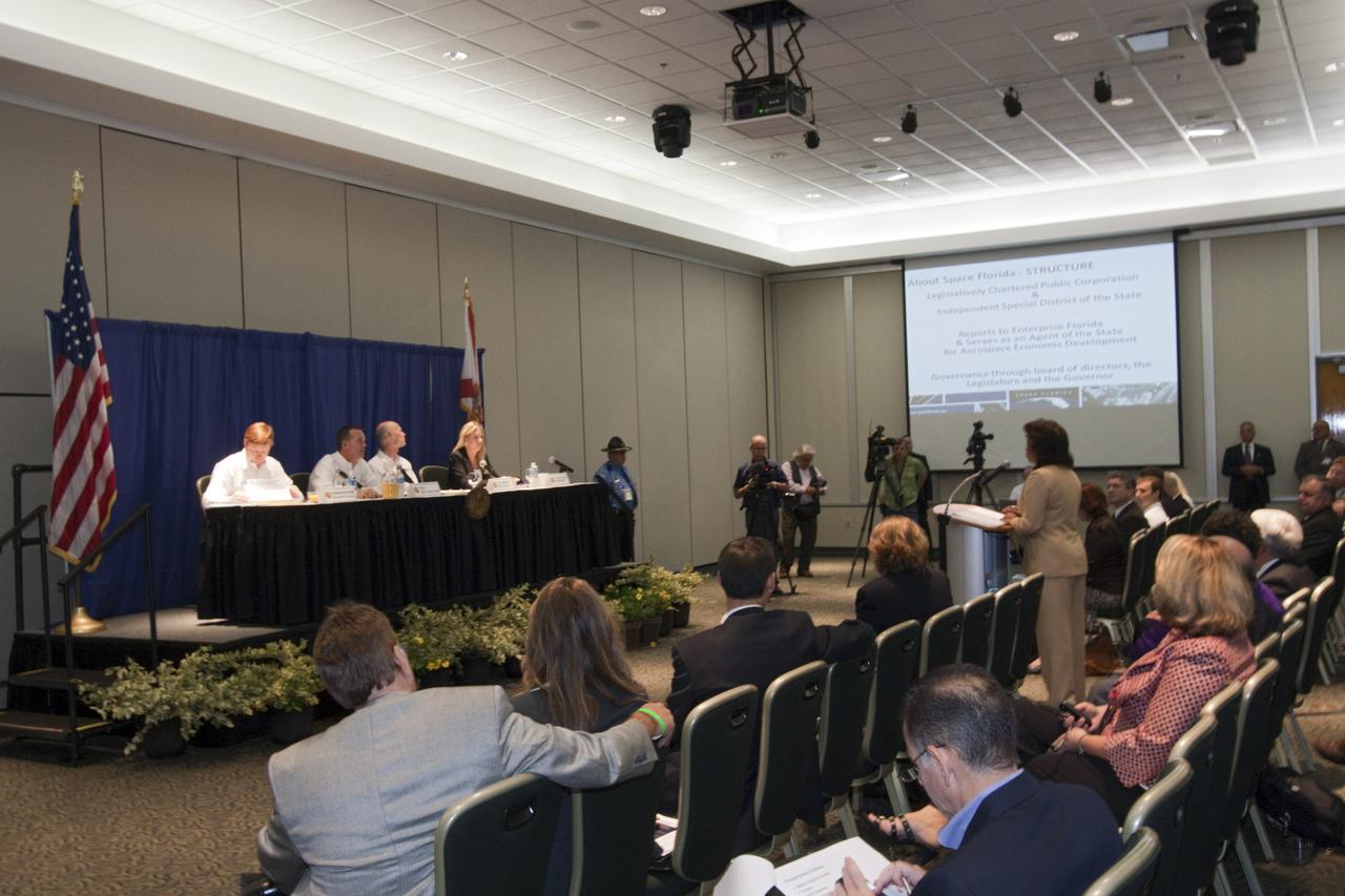 CAPE CANAVERAL, Fla. – Lt. Governor Jennifer Carroll, chairwoman of Space Florida, addresses the Florida Cabinet during its meeting at the Kennedy Space Center Visitor Complex, Fla., on Oct. 18. The Cabinet approved a resolution recognizing NASA Kennedy Space Center for its contributions to spaceflight and technological innovation. The Cabinet, seated, is made up of Adam Putnam, left, Agriculture commissioner, Jeff Atwater, chief financial officer, Florida Governor Rick Scott and Pam Bondi, attorney general. Photo credit: NASA_Jim Grossmann