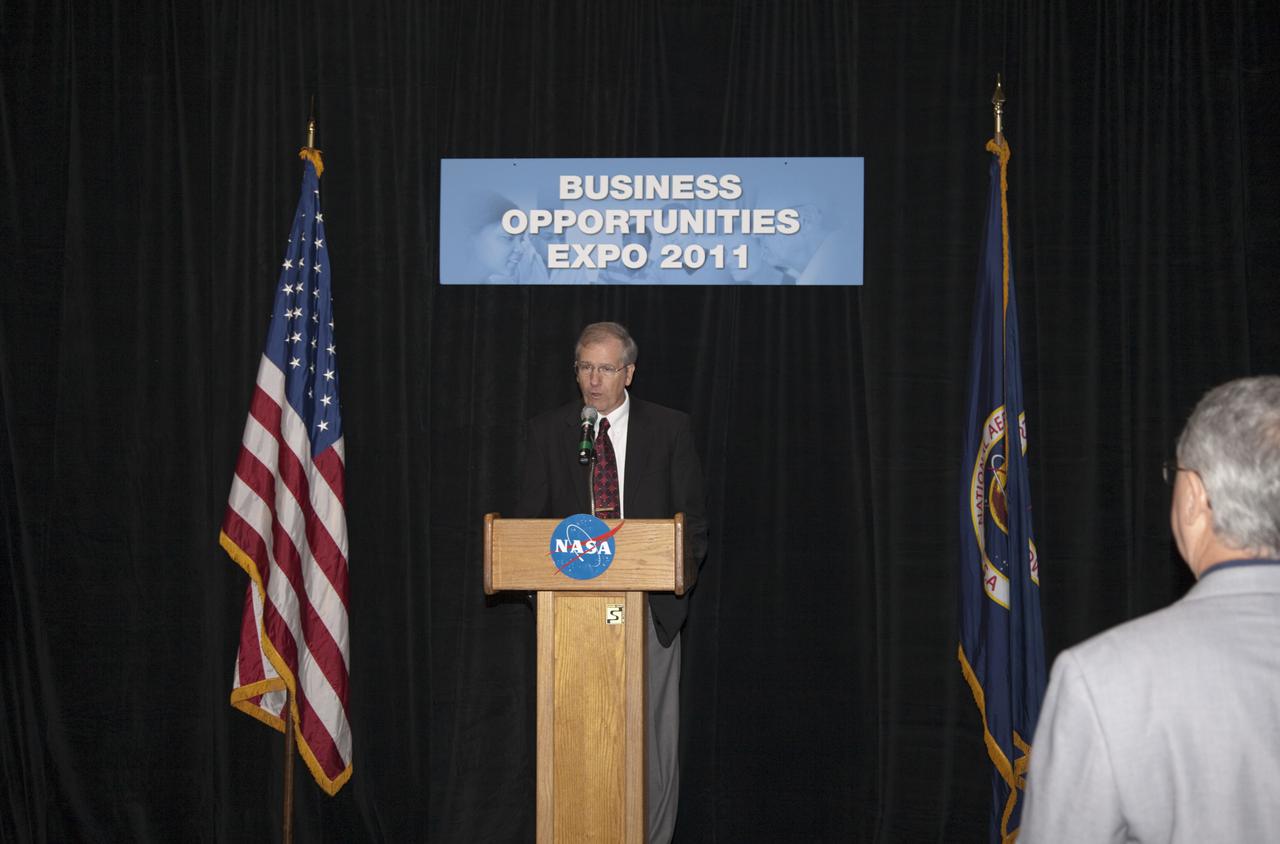 CAPE CANAVERAL, Fla. – NASA Kennedy Space Center Small Business Specialist Larry Third welcomes business leaders and other attendees to the annual Business Opportunities Expo 2011, in Cruise Terminal 4 at Port Canaveral in Florida. The trade show is sponsored by NASA Kennedy Space Center’s Prime Contractor Board, the 45th Space Wing and Canaveral Port Authority.  The event is free and open to the public. It features about 175 business and government exhibitors from across the nation and Brevard County and is geared toward business leaders who are interested in learning more about government contracting and what local and national vendors have to offer.  Photo credit: NASA_Gianni Woods