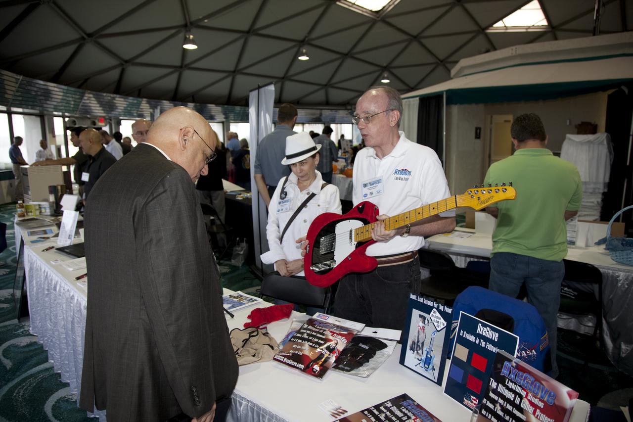 CAPE CANAVERAL, Fla. – Business leaders visit exhibitor booths at the annual Business Opportunities Expo 2011, in Cruise Terminal 4 at Port Canaveral in Florida. The trade show is sponsored by NASA Kennedy Space Center’s Prime Contractor Board, the 45th Space Wing and Canaveral Port Authority.  The event is free and open to the public. It features about 175 business and government exhibitors from across the nation and Brevard County and is geared toward business leaders who are interested in learning more about government contracting and what local and national vendors have to offer.  Photo credit: NASA_Gianni Woods
