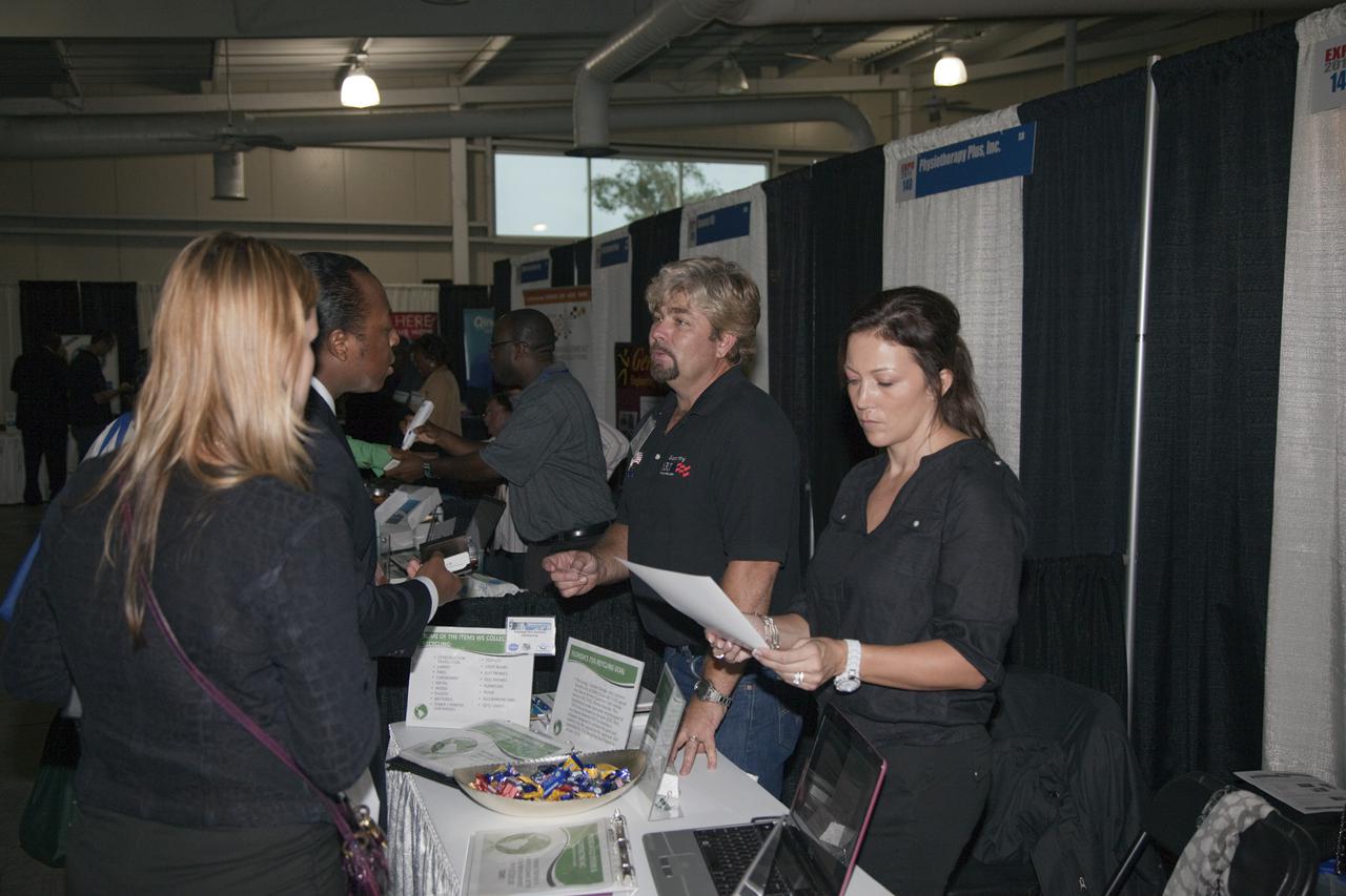 CAPE CANAVERAL, Fla. – Business leaders visit exhibitor booths and ask questions at the annual Business Opportunities Expo 2011, in Cruise Terminal 4 at Port Canaveral in Florida. The trade show is sponsored by NASA Kennedy Space Center’s Prime Contractor Board, the 45th Space Wing and Canaveral Port Authority.  The event is free and open to the public. It features about 175 business and government exhibitors from across the nation and Brevard County and is geared toward business leaders who are interested in learning more about government contracting and what local and national vendors have to offer.  Photo credit: NASA_Gianni Woods