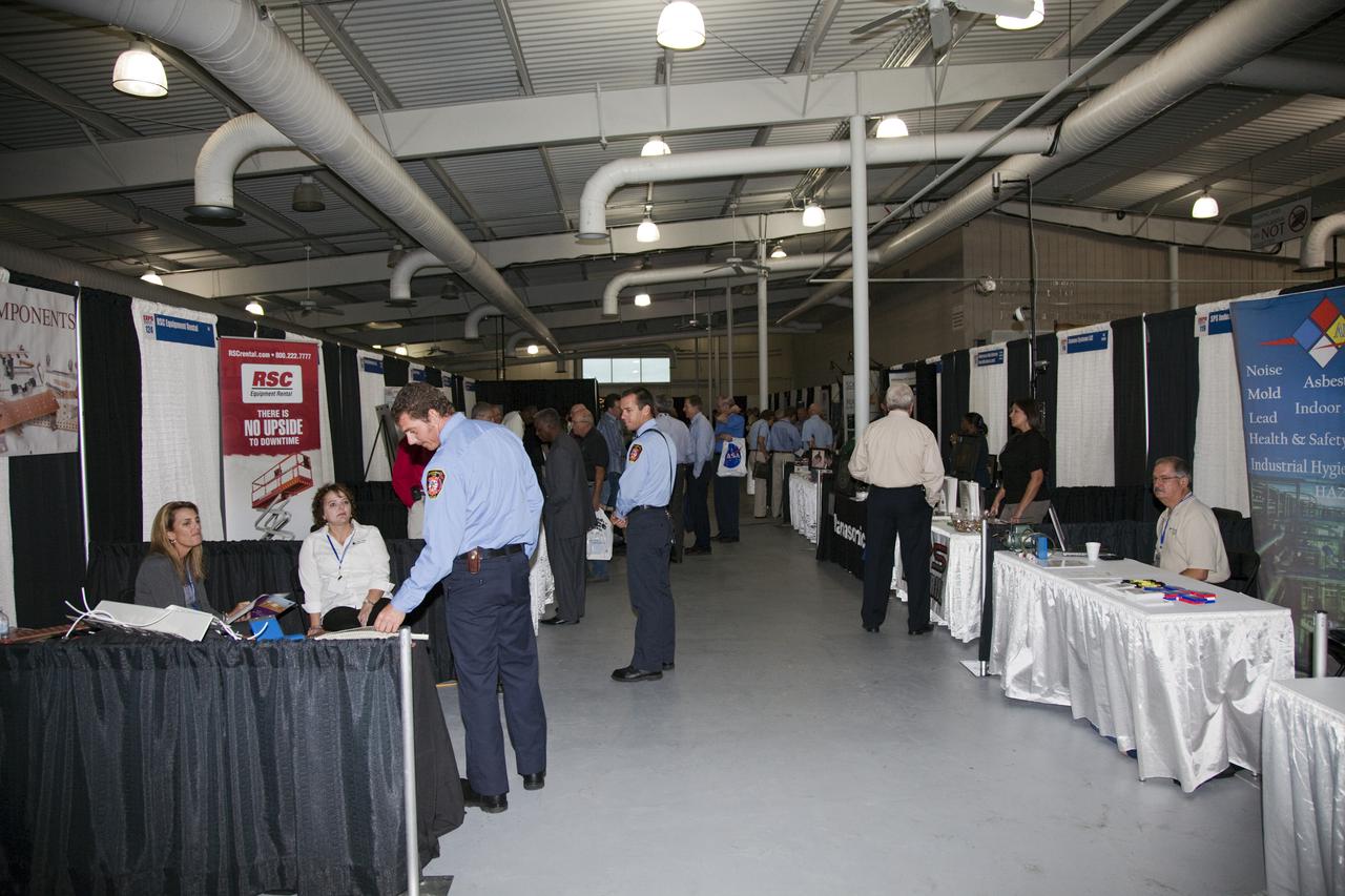 CAPE CANAVERAL, Fla. – Business leaders and members of the general public visit exhibitor booths at the annual Business Opportunities Expo 2011, in Cruise Terminal 4 at Port Canaveral in Florida. The trade show is sponsored by NASA Kennedy Space Center’s Prime Contractor Board, the 45th Space Wing and Canaveral Port Authority.  The event is free and open to the public. It features about 175 business and government exhibitors from across the nation and Brevard County and is geared toward business leaders who are interested in learning more about government contracting and what local and national vendors have to offer.  Photo credit: NASA_Gianni Woods