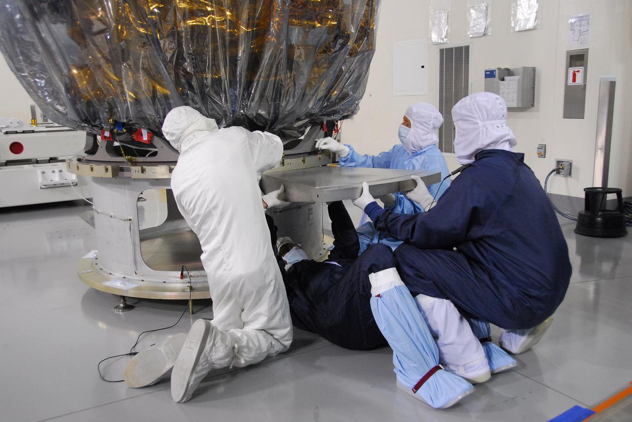 In a clean room inside the Astrotech Payload Processing Facility at Vandenberg Air Force Base in California, Ball Aerospace technicians NASA’s National Polar-orbiting Operational Environmental Satellite System Preparatory Project (NPP) spacecraft for its move to the launch pad. NPP represents a critical first step in building the next-generation of Earth-observing satellites. NPP will carry the first of the new sensors developed for this satellite fleet, now known as the Joint Polar Satellite System (JPSS), to be launched in 2016. NPP is the bridge between NASA's Earth Observing System (EOS) satellites and the forthcoming series of JPSS satellites. The mission will test key technologies and instruments for the JPSS missions. NPP is targeted to launch Oct. 28 from Space Launch Complex-2 aboard a United Launch Alliance Delta II rocket. For more information, visit http:__www.nasa.gov_NPP. Photo credit: NASA_VAFB