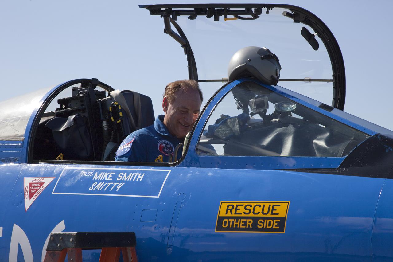 CAPE CANAVERAL, Fla. – Pilot Rick Svetkoff sits in the cockpit of a Starfighters, Inc. F-104 supersonic jet after conducting a high speed taxi test on the runway at the Shuttle Landing Facility (SLF) at NASA’s Kennedy Space Center in Florida. The Star Lab suborbital launch vehicle developed by 4Frontiers Corporation is attached to the right side of the jet.  4Frontiers is testing the Star Lab suborbital launch vehicle which has the potential to carry payloads into low earth orbit. Tests are being conducted to verify the aeronautical conditions of the Star Lab suborbital launch vehicle. This is the first of eight tests the launch vehicle will undergo. 4Frontiers Corporation is aiming for testing to be completed by early 2012, with commercial flights starting mid-2012. Starfighters, Inc. has signed a Space Act Agreement with NASA for the use of the SLF facilities at Kennedy Space Center. Photo credit: NASA_Gianni M. Woods