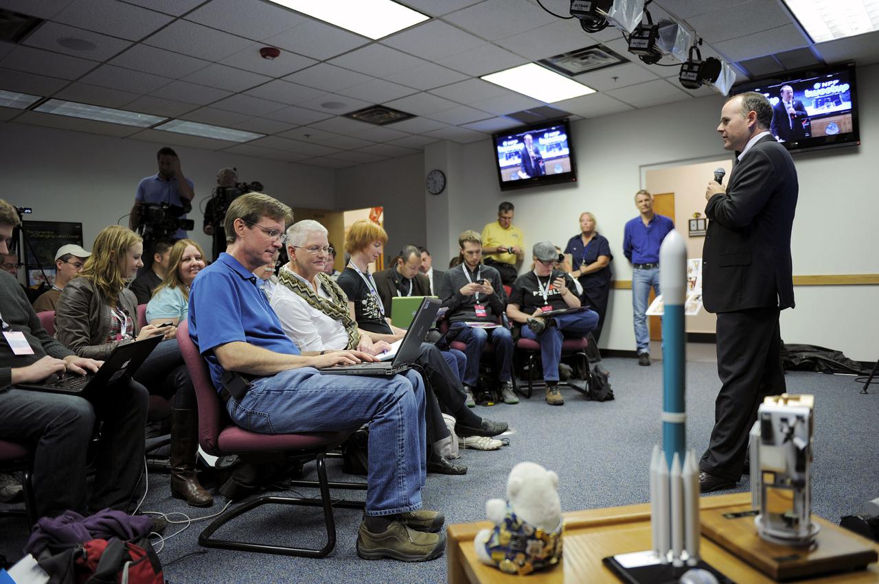 VANDENBERG AIR FORCE BASE, Calif. – A speaker talks with a group of Tweetup participants at Vandenberg Air Force Base in California during prelaunch activities for NASA’s National Polar-orbiting Operational Environmental Satellite System Preparatory Project (NPP) spacecraft mission. The tweeters will share their experiences with followers through the social networking site Twitter.  NPP represents a critical first step in building the next-generation of Earth-observing satellites. NPP will carry the first of the new sensors developed for this satellite fleet, now known as the Joint Polar Satellite System (JPSS) to be launched in 2016. NPP is the bridge between NASA's Earth Observing System (EOS) satellites and the forthcoming series of JPSS satellites. The mission will test key technologies and instruments for the JPSS missions. NPP is targeted to launch Oct. 28 from Space Launch Complex-2 aboard a United Launch Alliance Delta II rocket. For more information, visit http:__www.nasa.gov_NPP. Photo credit: NASA_Kim Shiflett