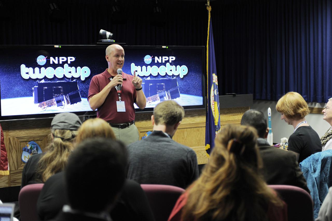 VANDENBERG AIR FORCE BASE, Calif. – A speaker talks with a group of Tweetup participants at Vandenberg Air Force Base in California during prelaunch activities for NASA’s National Polar-orbiting Operational Environmental Satellite System Preparatory Project (NPP) spacecraft mission. The tweeters will share their experiences with followers through the social networking site Twitter.  NPP represents a critical first step in building the next-generation of Earth-observing satellites. NPP will carry the first of the new sensors developed for this satellite fleet, now known as the Joint Polar Satellite System (JPSS) to be launched in 2016. NPP is the bridge between NASA's Earth Observing System (EOS) satellites and the forthcoming series of JPSS satellites. The mission will test key technologies and instruments for the JPSS missions. NPP is targeted to launch Oct. 28 from Space Launch Complex-2 aboard a United Launch Alliance Delta II rocket. For more information, visit http:__www.nasa.gov_NPP. Photo credit: NASA_Kim Shiflett