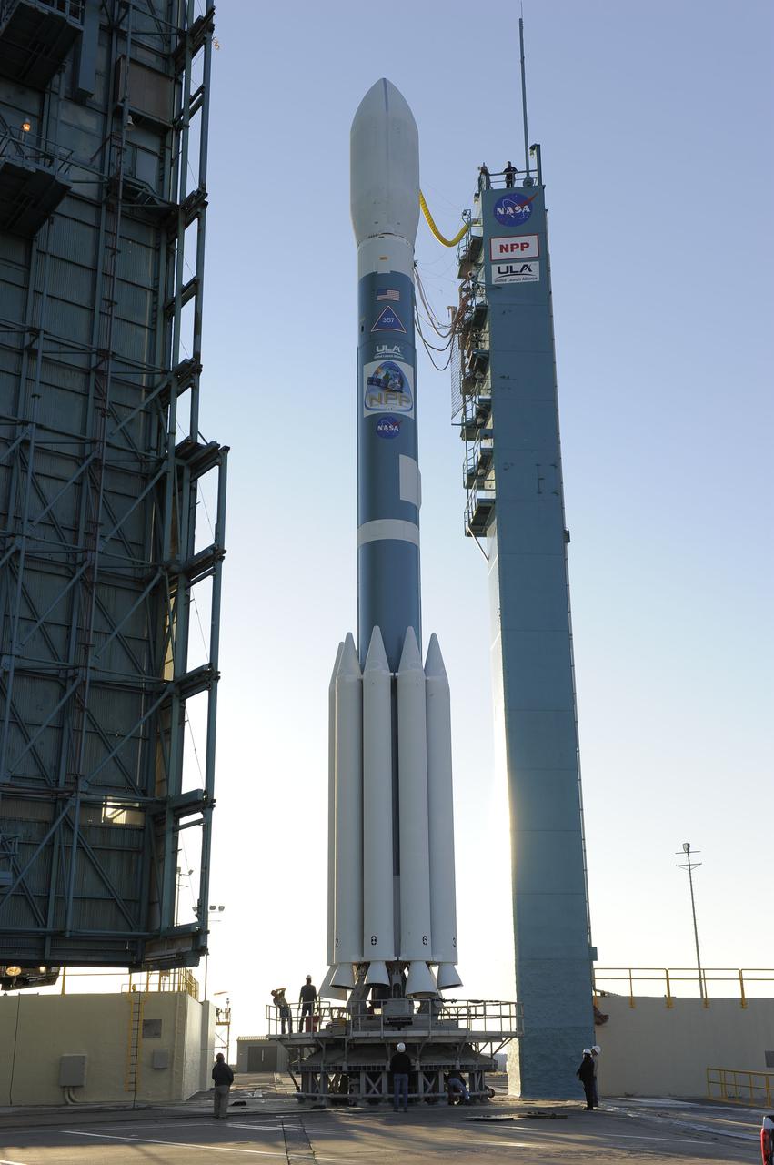 VANDENBERG AIR FORCE BASE, Calif. – At Vandenberg Air Force Base's Space Launch Complex-2 in California, the mobile service tower rolls back from around a United Launch Alliance Delta II rocket with the National Polar-orbiting Operational Environmental Satellite System Preparatory Project (NPP) spacecraft aboard. NPP represents a critical first step in building the next-generation of Earth-observing satellites. NPP will carry the first of the new sensors developed for this satellite fleet, now known as the Joint Polar Satellite System (JPSS) to be launched in 2016. NPP is the bridge between NASA's Earth Observing System (EOS) satellites and the forthcoming series of JPSS satellites. The mission will test key technologies and instruments for the JPSS missions. For more information, visit http:__www.nasa.gov_NPP. Photo credit: NASA_Kim Shiflett