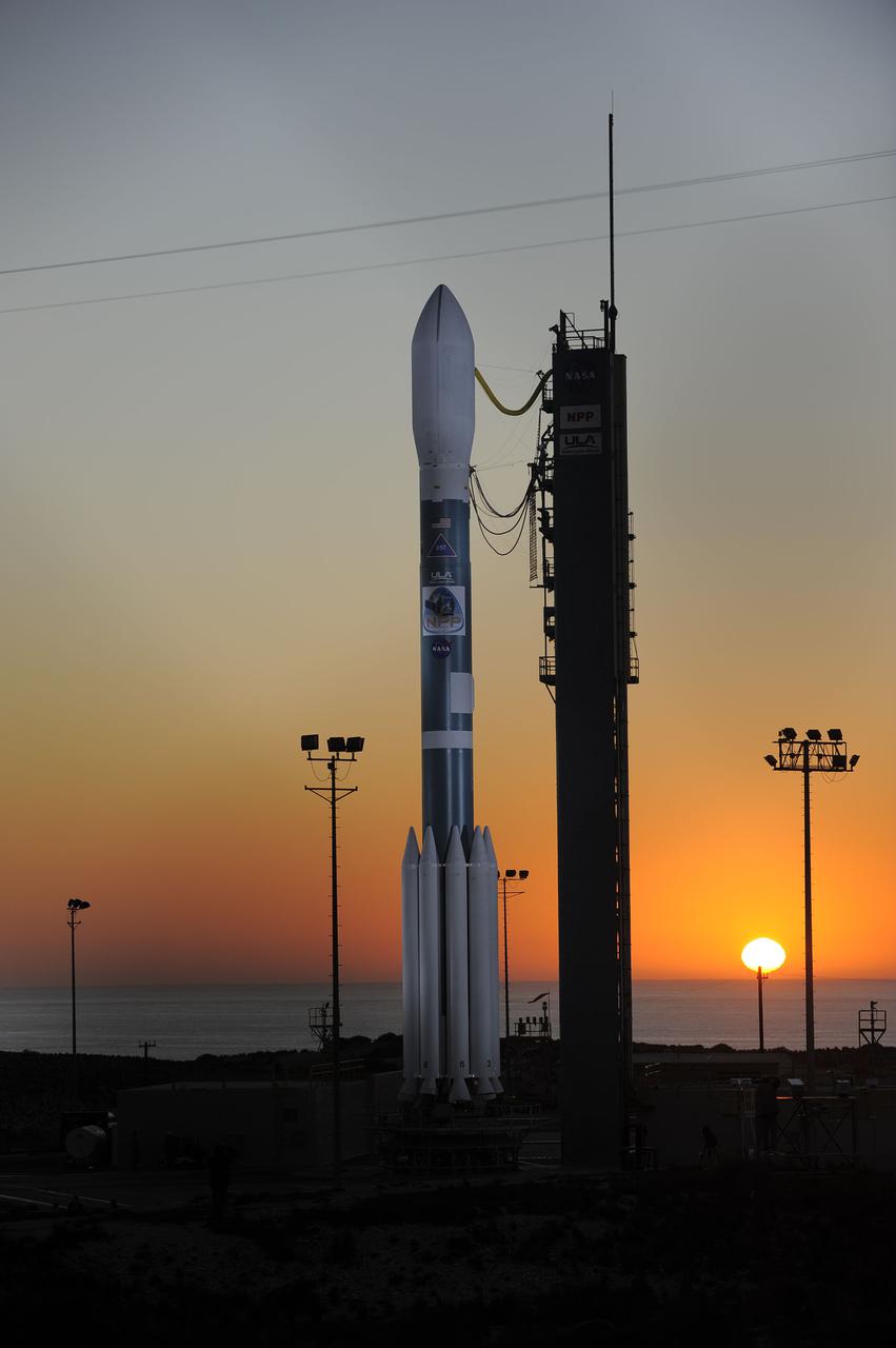 VANDENBERG AIR FORCE BASE, Calif. – At Vandenberg Air Force Base's Space Launch Complex-2 in California, a United Launch Alliance Delta II rocket with the National Polar-orbiting Operational Environmental Satellite System Preparatory Project (NPP) spacecraft aboard stands by itself on the launch pad following rollback of the mobile service tower. NPP represents a critical first step in building the next-generation of Earth-observing satellites. NPP will carry the first of the new sensors developed for this satellite fleet, now known as the Joint Polar Satellite System (JPSS) to be launched in 2016. NPP is the bridge between NASA's Earth Observing System (EOS) satellites and the forthcoming series of JPSS satellites. The mission will test key technologies and instruments for the JPSS missions. For more information, visit http:__www.nasa.gov_NPP. Photo credit: NASA_Kim Shiflett