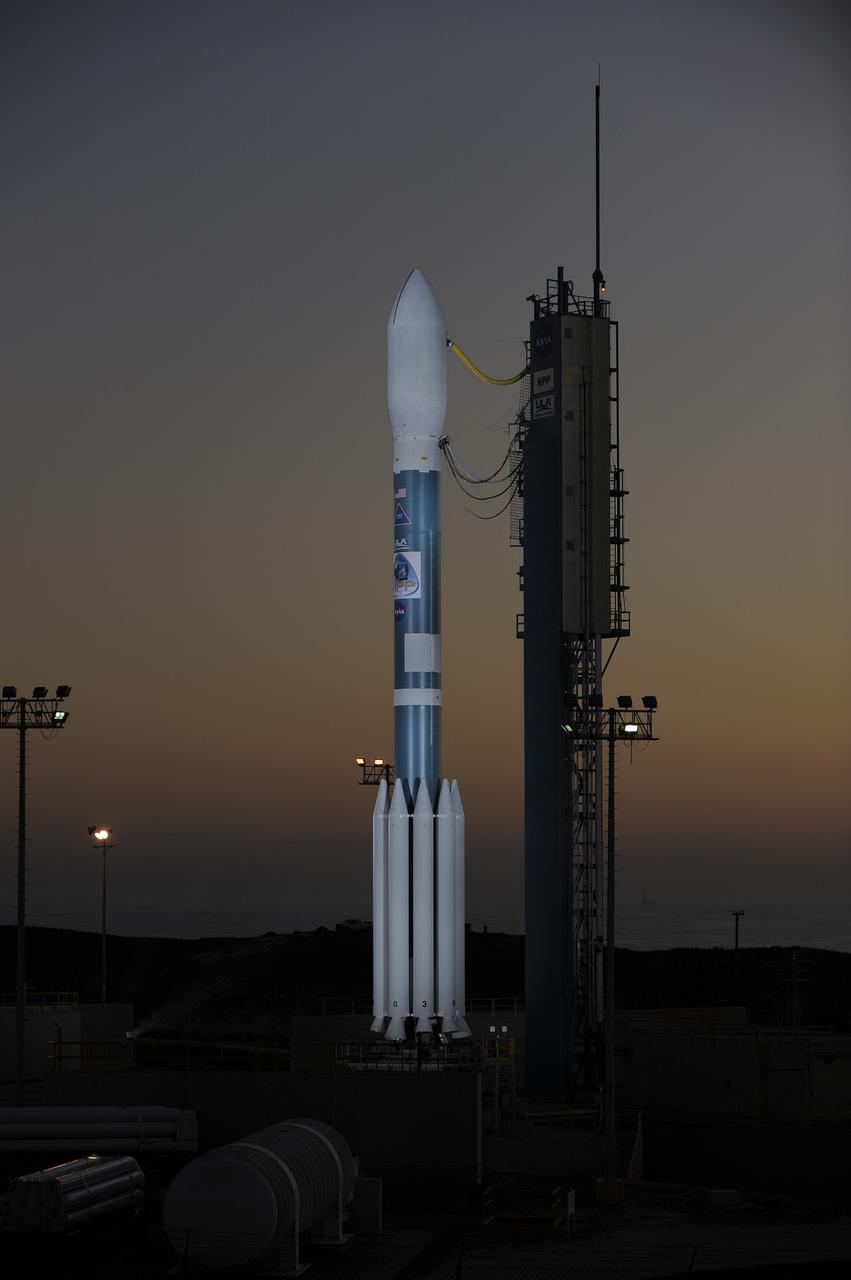 VANDENBERG AIR FORCE BASE, Calif. – At Vandenberg Air Force Base's Space Launch Complex-2 in California, a United Launch Alliance Delta II rocket with the National Polar-orbiting Operational Environmental Satellite System Preparatory Project (NPP) spacecraft aboard stands by itself on the launch pad following rollback of the mobile service tower. NPP represents a critical first step in building the next-generation of Earth-observing satellites. NPP will carry the first of the new sensors developed for this satellite fleet, now known as the Joint Polar Satellite System (JPSS) to be launched in 2016. NPP is the bridge between NASA's Earth Observing System (EOS) satellites and the forthcoming series of JPSS satellites. The mission will test key technologies and instruments for the JPSS missions. For more information, visit http:__www.nasa.gov_NPP. Photo credit: NASA_Kim Shiflett