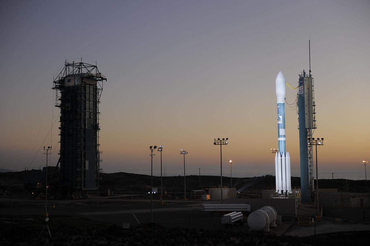 VANDENBERG AIR FORCE BASE, Calif. – At Vandenberg Air Force Base's Space Launch Complex-2 in California, a United Launch Alliance Delta II rocket with the National Polar-orbiting Operational Environmental Satellite System Preparatory Project (NPP) spacecraft aboard stands by itself on the launch pad following rollback of the mobile service tower. NPP represents a critical first step in building the next-generation of Earth-observing satellites. NPP will carry the first of the new sensors developed for this satellite fleet, now known as the Joint Polar Satellite System (JPSS) to be launched in 2016. NPP is the bridge between NASA's Earth Observing System (EOS) satellites and the forthcoming series of JPSS satellites. The mission will test key technologies and instruments for the JPSS missions. For more information, visit http:__www.nasa.gov_NPP. Photo credit: NASA_Kim Shiflett