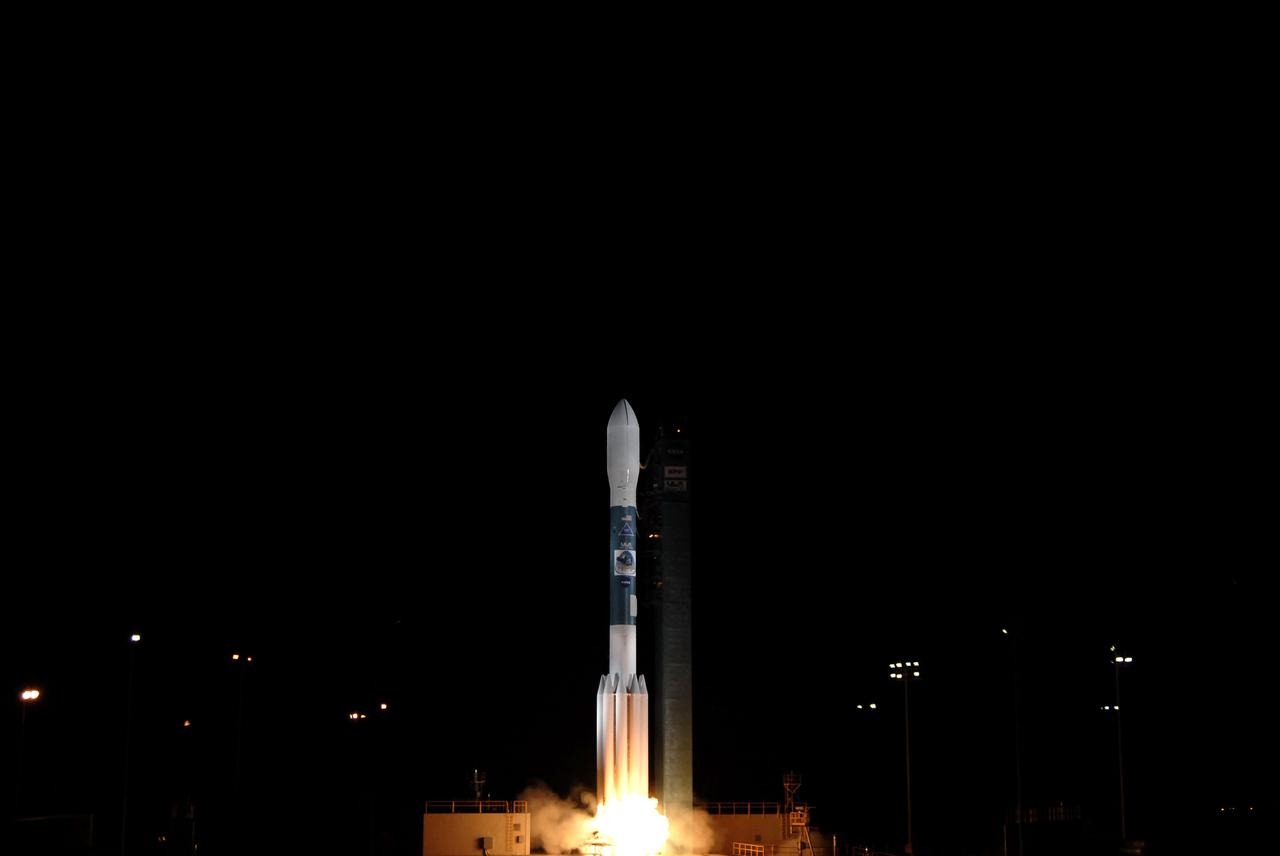 VANDENBERG AIR FORCE BASE, Calif. -- At Space Launch Complex-2 on Vandenberg Air Force Base in California, the engines ignite beneath the United Launch Alliance Delta II rocket carrying NASA's National Polar-orbiting Operational Environmental Satellite System Preparatory Project (NPP) into space. Liftoff was at 2:48 a.m. PDT. NPP represents a critical first step in building the next-generation of Earth-observing satellites. NPP will carry the first of the new sensors developed for this satellite fleet, now known as the Joint Polar Satellite System (JPSS) to be launched in 2016. NPP is the bridge between NASA's Earth Observing System (EOS) satellites and the forthcoming series of JPSS satellites. The mission will test key technologies and instruments for the JPSS missions. For more information, visit http:__www.nasa.gov_NPP. Photo credit: NASA_Kim Shiflett
