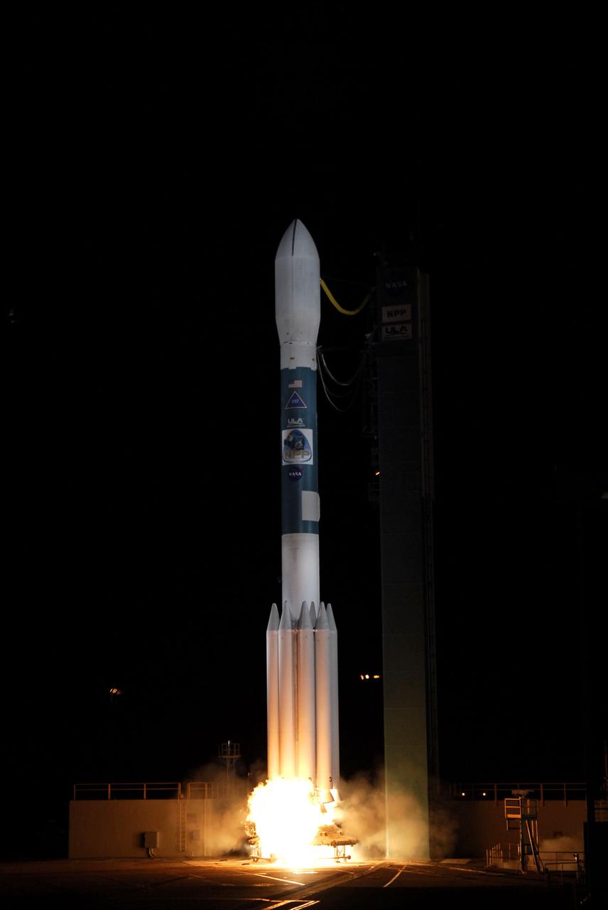 VANDENBERG AIR FORCE BASE, Calif. -- The ground begins to rumble at Space Launch Complex-2 on Vandenberg Air Force Base in California as the engines ignite beneath the United Launch Alliance Delta II rocket carrying NASA's National Polar-orbiting Operational Environmental Satellite System Preparatory Project (NPP) into space. Liftoff was at 2:48 a.m. PDT.  NPP represents a critical first step in building the next-generation of Earth-observing satellites. NPP will carry the first of the new sensors developed for this satellite fleet, now known as the Joint Polar Satellite System (JPSS) to be launched in 2016. NPP is the bridge between NASA's Earth Observing System (EOS) satellites and the forthcoming series of JPSS satellites. The mission will test key technologies and instruments for the JPSS missions. For more information, visit http:__www.nasa.gov_NPP. Photo credit: NASA_Kim Shiflett