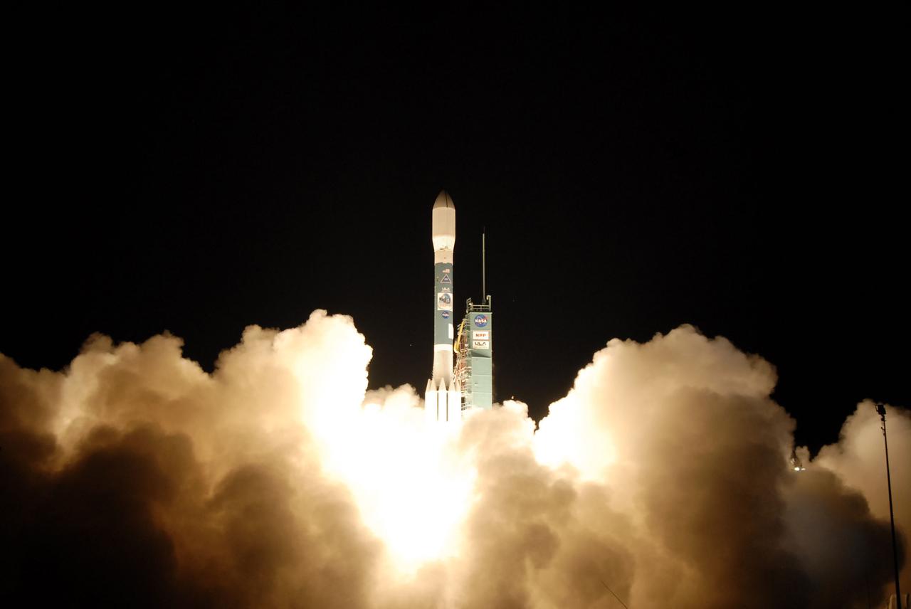 VANDENBERG AIR FORCE BASE, Calif. -- NASA's National Polar-orbiting Operational Environmental Satellite System Preparatory Project (NPP) roars off Space Launch Complex-2 at Vandenberg Air Force Base in California.  Liftoff was at 2:48 a.m. PDT aboard a United Launch Alliance Delta II rocket.   NPP represents a critical first step in building the next-generation of Earth-observing satellites. NPP will carry the first of the new sensors developed for this satellite fleet, now known as the Joint Polar Satellite System (JPSS) to be launched in 2016. NPP is the bridge between NASA's Earth Observing System (EOS) satellites and the forthcoming series of JPSS satellites. The mission will test key technologies and instruments for the JPSS missions. For more information, visit http:__www.nasa.gov_NPP. Photo credit: NASA_Kim Shiflett