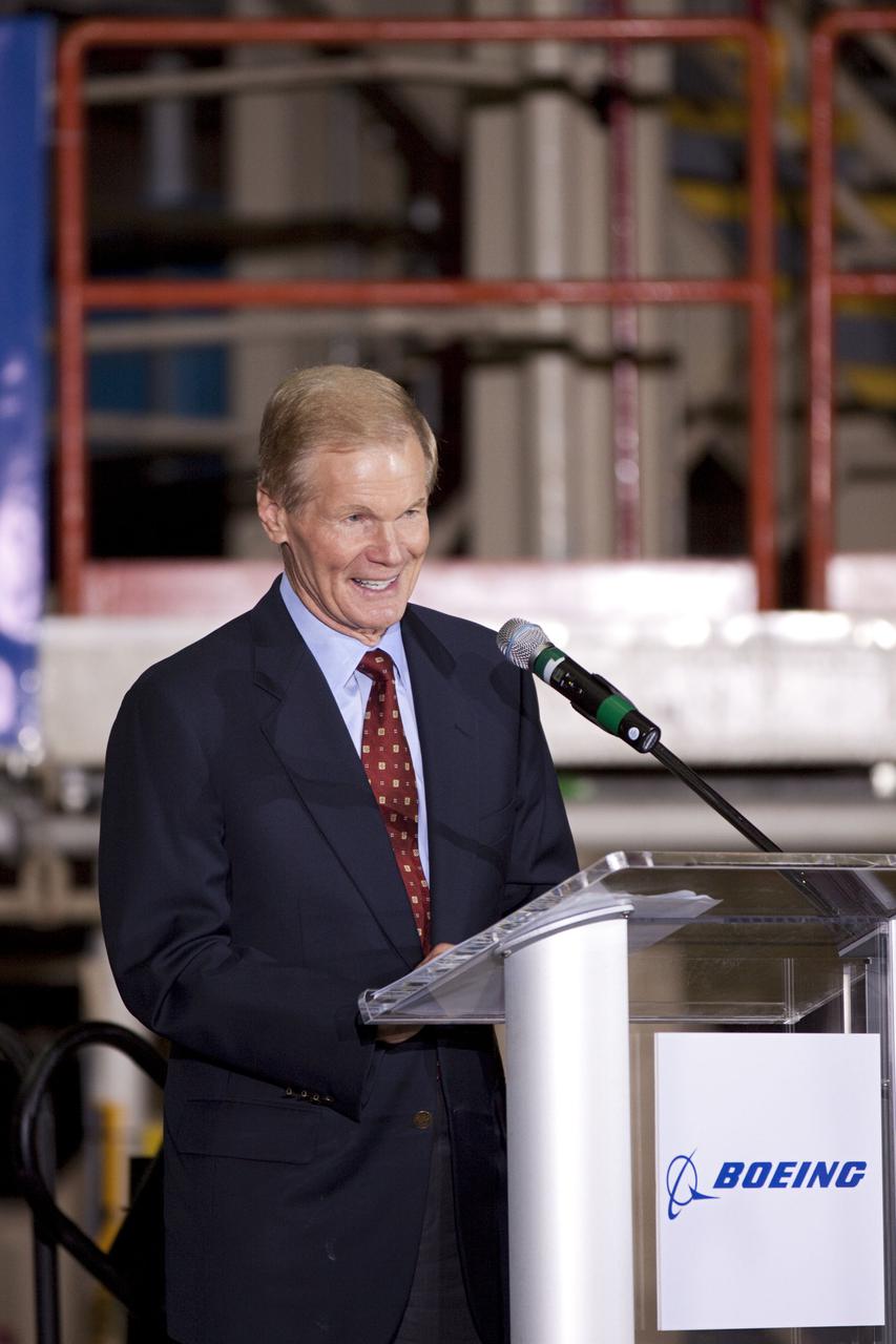 CAPE CANAVERAL, Fla. – In the Orbiter Processing Facility-3 (OPF-3) at NASA’s Kennedy Space Center in Florida, Sen. Bill Nelson of Florida, speaks to the audience during the ceremony announcing the signing of an innovative agreement between NASA and Space Florida.  NASA announced a partnership with Space Florida to occupy, use and modify Kennedy Space Center's Orbiter Processing Facility-3 (OPF-3), the Space Shuttle Main Engine Processing Facility and Processing Control Center. Space Florida has an agreement for use of the OPF-3 with the Boeing Company to manufacture and test the company's Crew Space Transportation (CST-100) spacecraft. The 15-year use permit deal is the latest step Kennedy is making as the center transitions from a historically government-only launch complex to a multi-user spaceport. For more information, visit http:__www.nasa.gov_exploration_commercial_index.html. Photo credit: NASA_Kim Shiflett