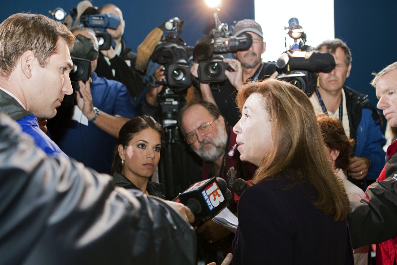 CAPE CANAVERAL, Fla. – In the Orbiter Processing Facility-3 (OPF-3) at NASA’s Kennedy Space Center in Florida, Lori Garver, NASA’s deputy administrator, speaks to the media following the ceremony which announced the signing of an innovative agreement between NASA and Space Florida.   NASA announced a partnership with Space Florida to occupy, use and modify Kennedy Space Center's Orbiter Processing Facility-3 (OPF-3), the Space Shuttle Main Engine Processing Facility and Processing Control Center. Space Florida has an agreement for use of the OPF-3 with the Boeing Company to manufacture and test the company's Crew Space Transportation (CST-100) spacecraft. The 15-year use permit deal is the latest step Kennedy is making as the center transitions from a historically government-only launch complex to a multi-user spaceport. For more information, visit http:__www.nasa.gov_exploration_commercial_index.html. Photo credit: NASA_Kim Shiflett