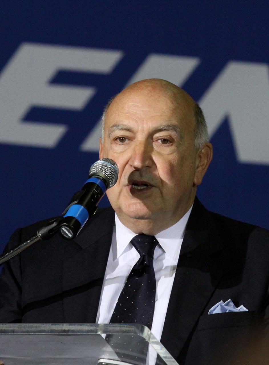 CAPE CANAVERAL, Fla. – In the Orbiter Processing Facility-3 (OPF-3) at NASA’s Kennedy Space Center in Florida, Frank DiBello, president of Space Florida, speaks to the audience after announcing the signing of an innovative agreement between NASA and Space Florida.     NASA announced a partnership with Space Florida to occupy, use and modify Kennedy Space Center's Orbiter Processing Facility-3 (OPF-3), the Space Shuttle Main Engine Processing Facility and Processing Control Center. Space Florida has an agreement for use of the OPF-3 with the Boeing Company to manufacture and test the company's Crew Space Transportation (CST-100) spacecraft. The 15-year use permit deal is the latest step Kennedy is making as the center transitions from a historically government-only launch complex to a multi-user spaceport. For more information, visit http:__www.nasa.gov_exploration_commercial_index.html. Photo credit: NASA_Ken Thornsley