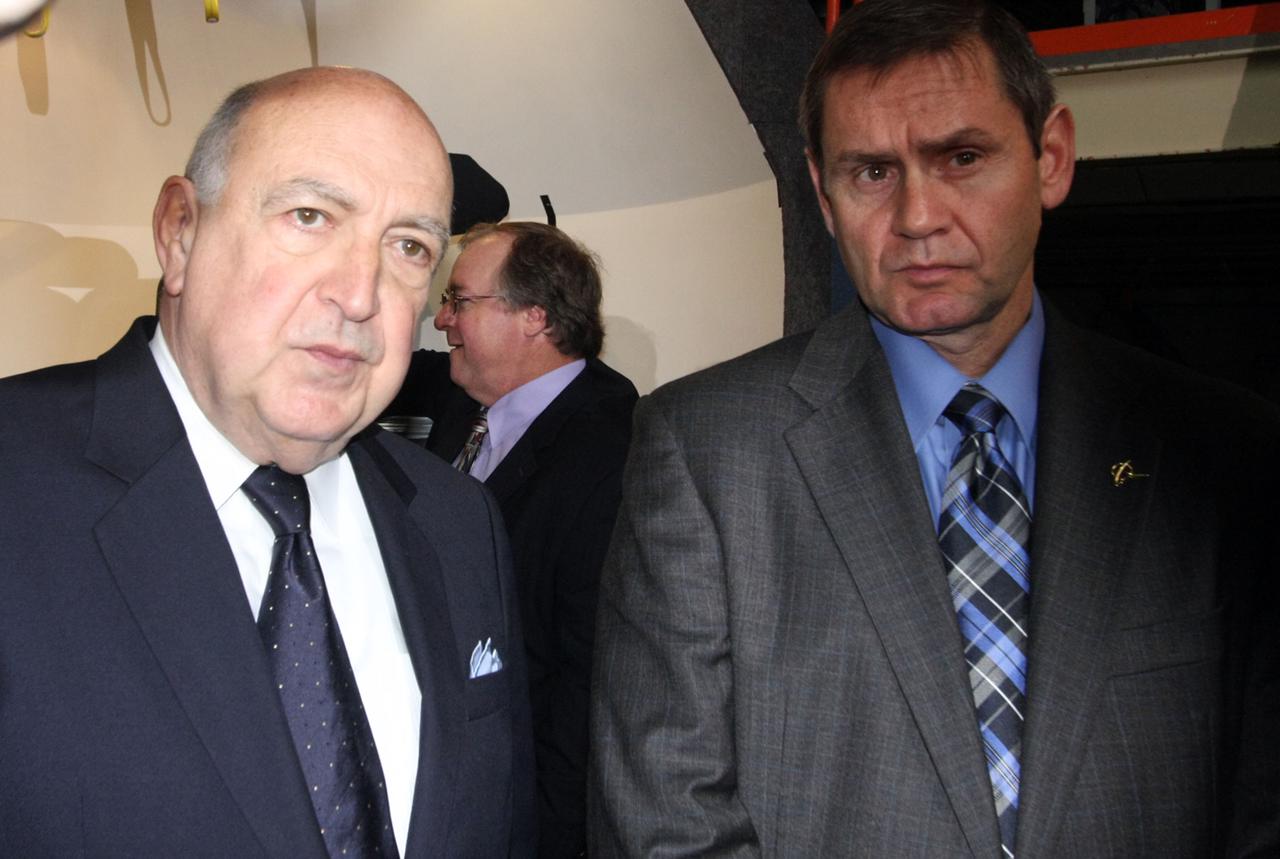 CAPE CANAVERAL, Fla. – In the Orbiter Processing Facility-3 (OPF-3) at NASA’s Kennedy Space Center in Florida, from left, Frank DiBello, president of Space Florida and John Elbon, vice president and general manager of Boeing's Space Exploration, stand before a full-scale mockup of The Boeing Company’s CST-100 spacecraft after the ceremony which announced the signing of an innovative agreement between NASA and Space Florida. NASA announced a partnership with Space Florida to occupy, use and modify Kennedy Space Center's Orbiter Processing Facility-3 (OPF-3), the Space Shuttle Main Engine Processing Facility and Processing Control Center. Space Florida has an agreement for use of the OPF-3 with the Boeing Company to manufacture and test the company's Crew Space Transportation (CST-100) spacecraft. The 15-year use permit deal is the latest step Kennedy is making as the center transitions from a historically government-only launch complex to a multi-user spaceport. For more information, visit http:__www.nasa.gov_exploration_commercial_index.html. Photo credit: NASA_Ken Thornsley