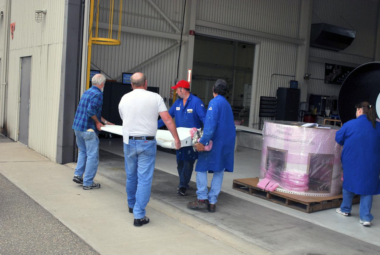 Pegasus/Nustar, Arival for the Aft Skirt & Fins, Installation of the Aft Skirt to the Aft End of Stage 1