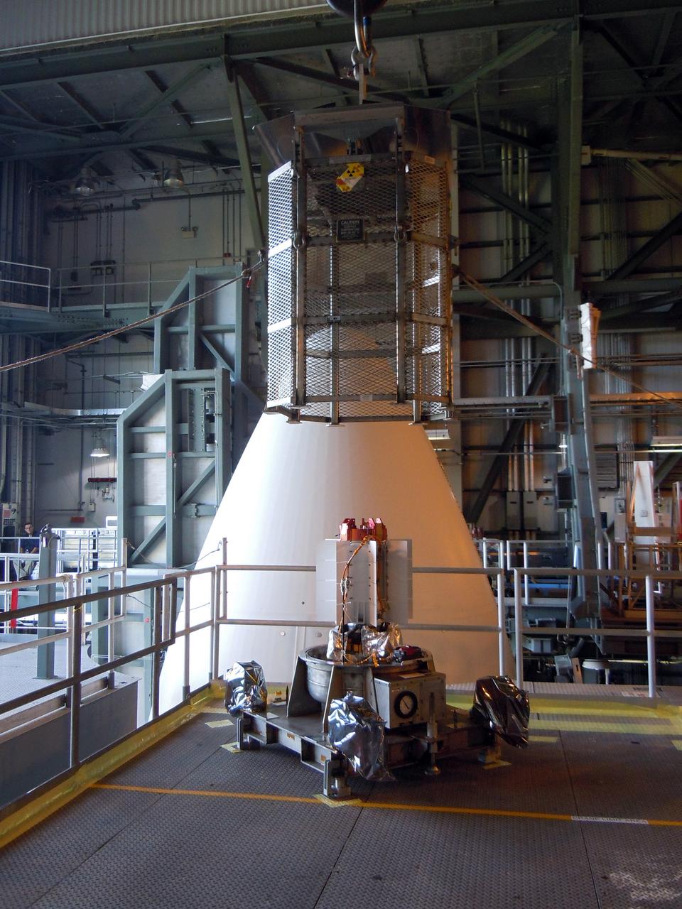 MMRTG Loaded into Spacecraft at VIF