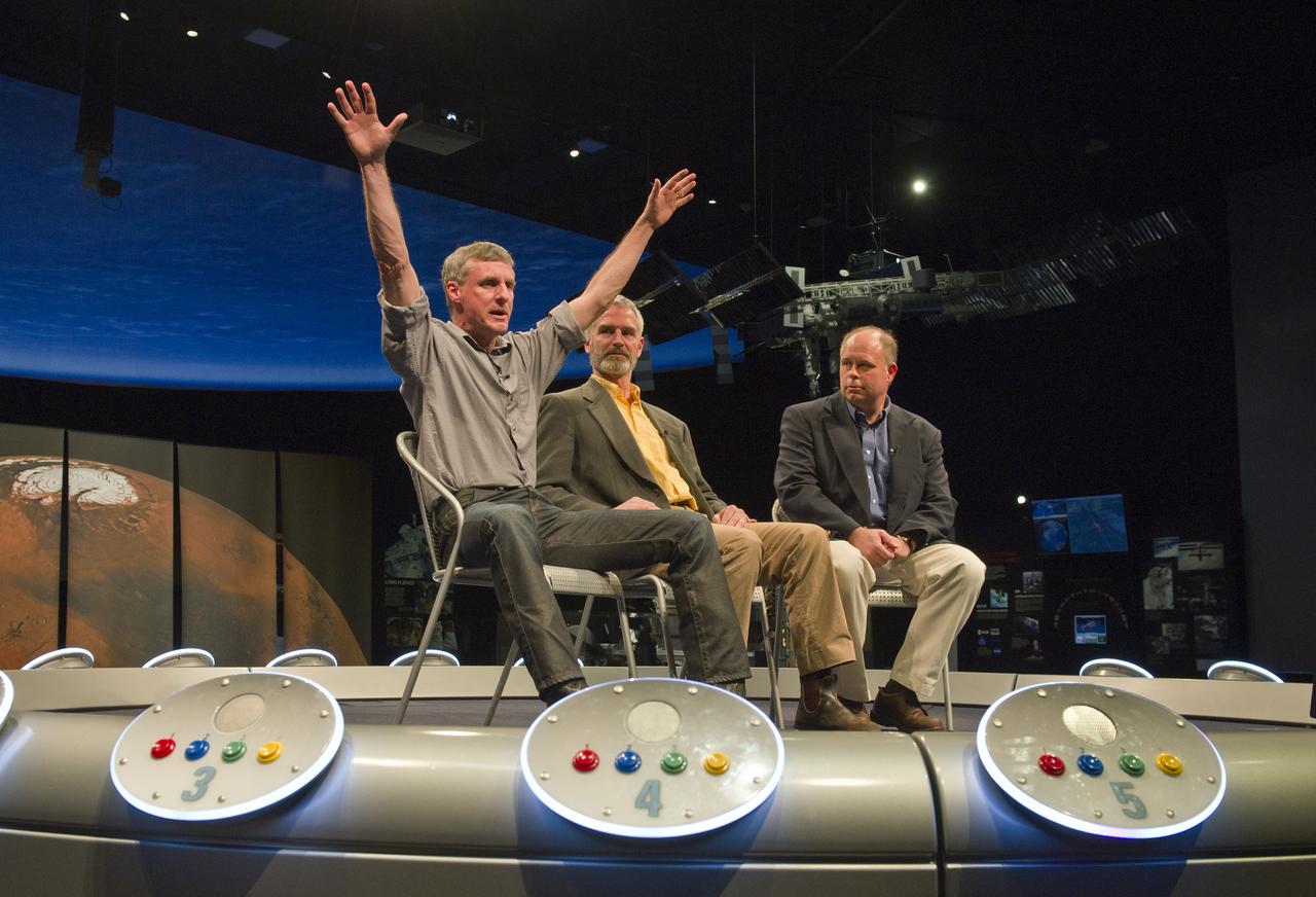 Dr. Steve Squyres, from Cornell University, left, talks during a panel discussion on the Mars Program, Thursday, Jan. 13, 2011, at the Smithsonian National Air and Space Museum in Washington as Dr. Jack Mustard, from Brown University and Dr. John Grant, moderator, right, look on. Prominent scientists and the head of the Mars Exploration Program gathered at the Smithsonian to discuss evidence of water on Mars; current Program status, including the 7th Anniversary of the Mars rovers and the upcoming Mars Science Laboratory mission also giving previews of the exciting discoveries to come. Photo Credit: (NASA/Paul E. Alers)