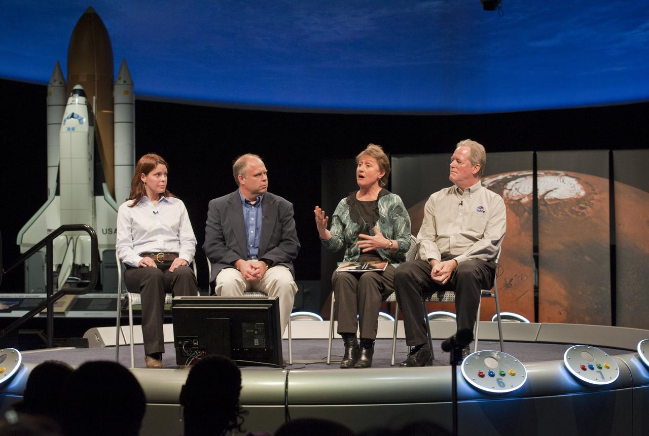 Dr. Mary Voytek, NASA Astrobiology Program Manager, second from right, talks during panel discussion as Dr. Jennifer Elgenbrode, from Goddard Space Flight Center, left, Dr. John Grant  and Dr. Michael Meyer, NASA Mars lead scientist, right look on during a Mars Program Update where prominent scientists discussed evidence of water on Mars, current Program status, including the 7th Anniversary of the Mars rovers and the upcoming Mars Science Laboratory mission and previewing exciting discoveries to come, Thursday, Jan. 13, 2011, at the Smithsonian National Air and Space Museum in Washington.  Photo Credit: (NASA/Paul E. Alers)