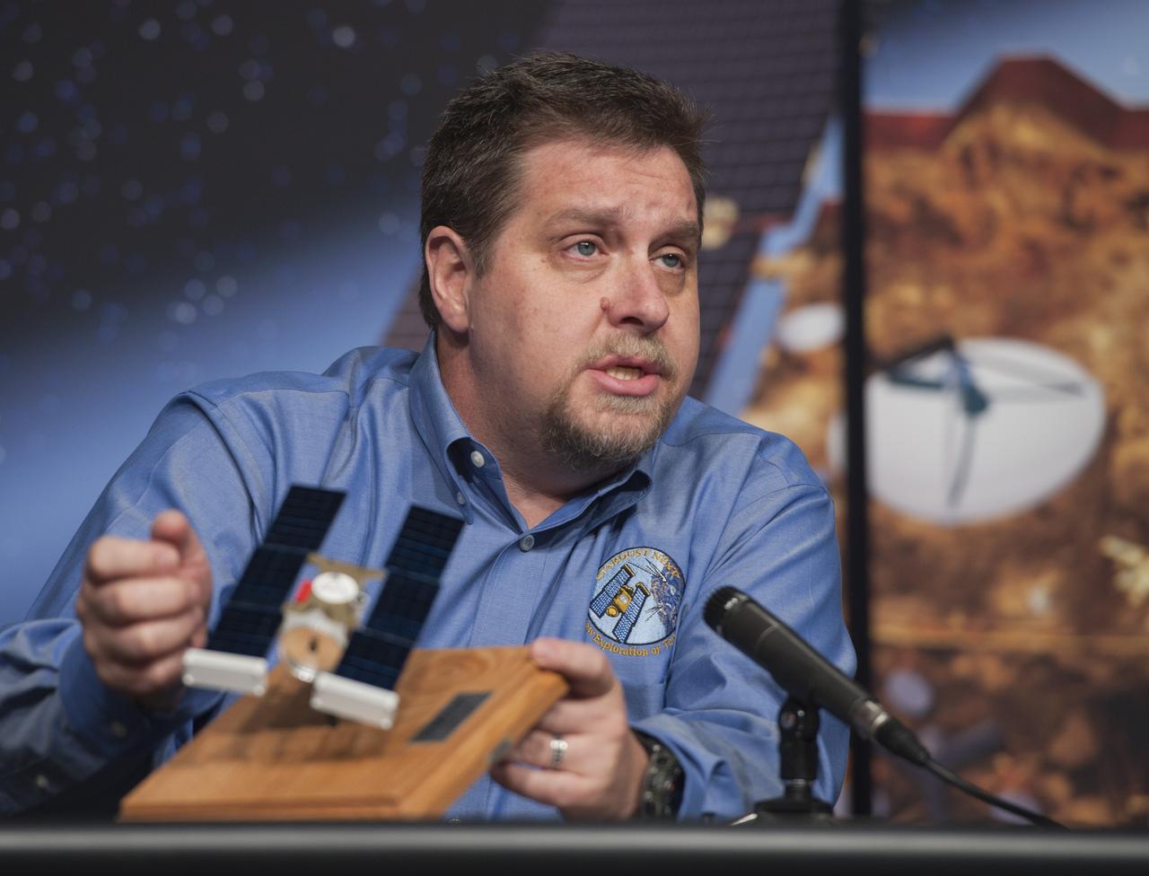 Tim Larson, Stardust NExT Project Manager, speaks during a news briefing, Wednesday, Jan. 19, 2011, at NASA Headquarters in Washington. On Feb. 14, 2011 NASA's Stardust-NExT (New Exploration of Tempel 1) mission will encounter Comet Tempel 1, providing a unique opportunity to measure the dust properties which will also provide a comparison between two observations of a single comet, Tempel 1, taken before and after a single orbital pass around the sun. Photo Credit: (NASA/Paul E. Alers)