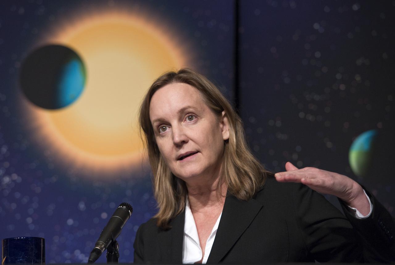 Debra Fischer, a professor of Astronomy at Yale University, speaks during a news conference, Wednesday, Feb. 2, 2010, at NASA Headquarters in Washington. Scientists using NASA's Kepler, a space telescope, recently discovered six planets made of a mix of rock and gases orbiting a single sun-like star, known as Kepler-11, which is located approximately 2,000 light years from Earth. Photo Credit: (NASA/Paul E. Alers)