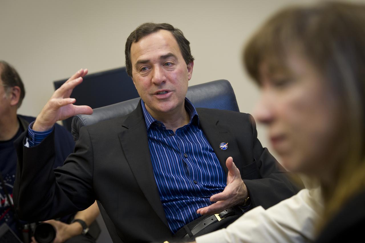 Sierra Nevada Space Systems chairman Mark Sirangello talks to NASA Deputy Administrator Lori Garver, on Saturday, Feb. 5, 2011, in Louisville, Colo. Sierra Nevada's Dream Chaser spacecraft is under development with support from NASA's Commercial Crew Development Program to provide crew transportation to and from low Earth orbit.  NASA is helping private companies develop innovative technologies to ensure that the U.S. remains competitive in future space endeavors. Photo Credit: (NASA/Bill Ingalls)
