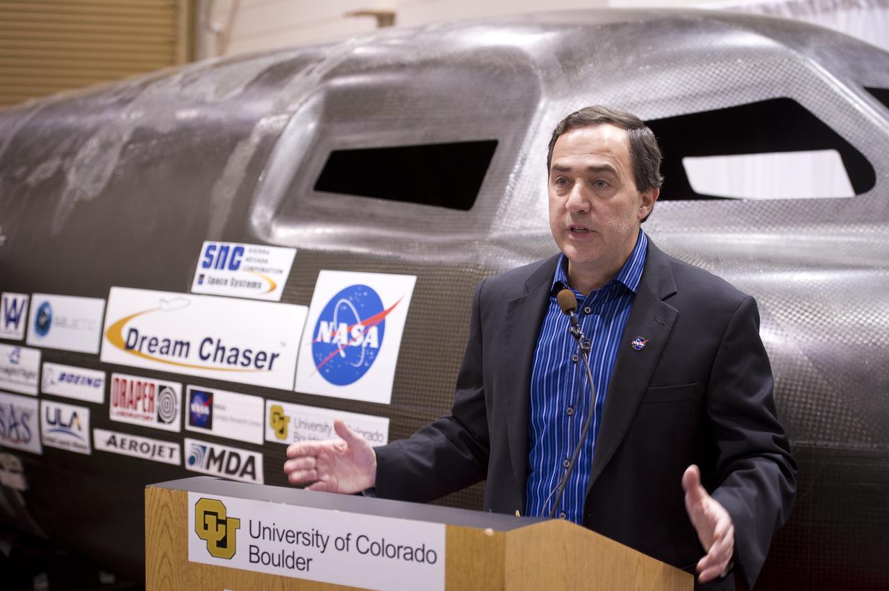 Sierra Nevada Space Systems chairman Mark Sirangello talks during a press conference with Sierra Nevada's Dream Chaser spacecraft in the background on Saturday, Feb. 5, 2011, at the University of Colorado at Boulder.  Sierra Nevada's Dream Chaser spacecraft is under development with support from NASA's Commercial Crew Development Program to provide crew transportation to and from low Earth orbit.  NASA is helping private companies develop innovative technologies to ensure that the U.S. remains competitive in future space endeavors. Photo Credit: (NASA/Bill Ingalls)
