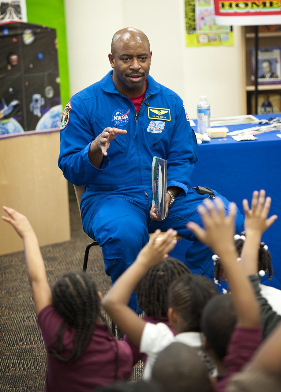 Leland Melvin, NASA Associate Administrator for Education and former space shuttle astronaut, answers questions from students about his experience as an astronaut on Tuesday, Feb. 8, 2011, at Ferebee-Hope Elementary School in Washington, DC.  Ferebee-Hope Elementary School, in collaboration with Reading is Fundamental (RIF), hosted this event in honor of Black History Month, and to highlight the importance of reading.  Photo Credit: (NASA/Carla Cioffi)  