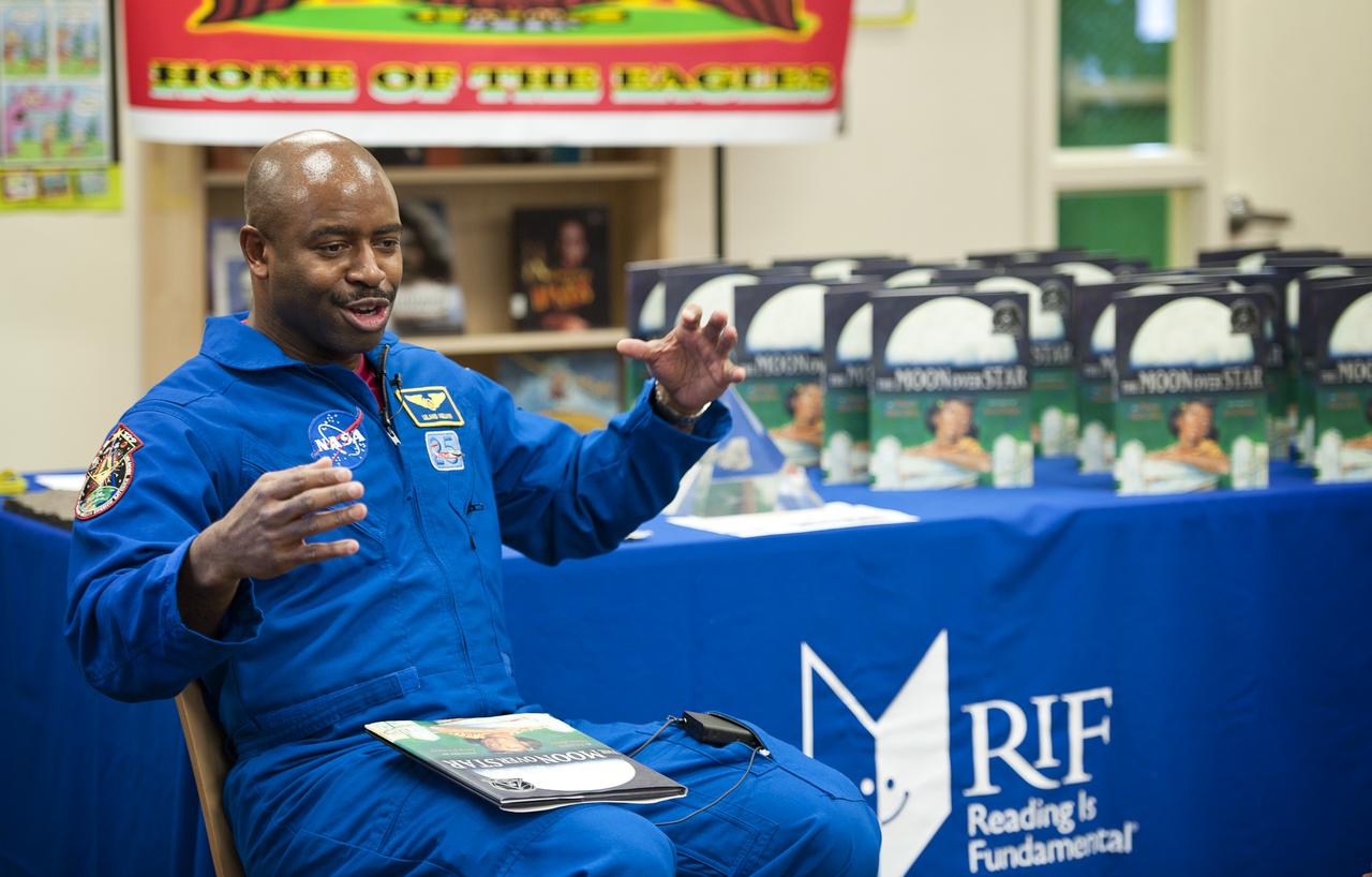 Leland Melvin, NASA Associate Administrator for Education and former space shuttle astronaut, speaks to students about his experience as an astronaut on Tuesday, Feb. 8, 2011, at Ferebee-Hope Elementary School in Washington, DC.  Ferebee-Hope Elementary School, in collaboration with Reading is Fundamental (RIF), hosted this event in honor of Black History Month, and to highlight the importance of reading.  Photo Credit: (NASA/Carla Cioffi)  