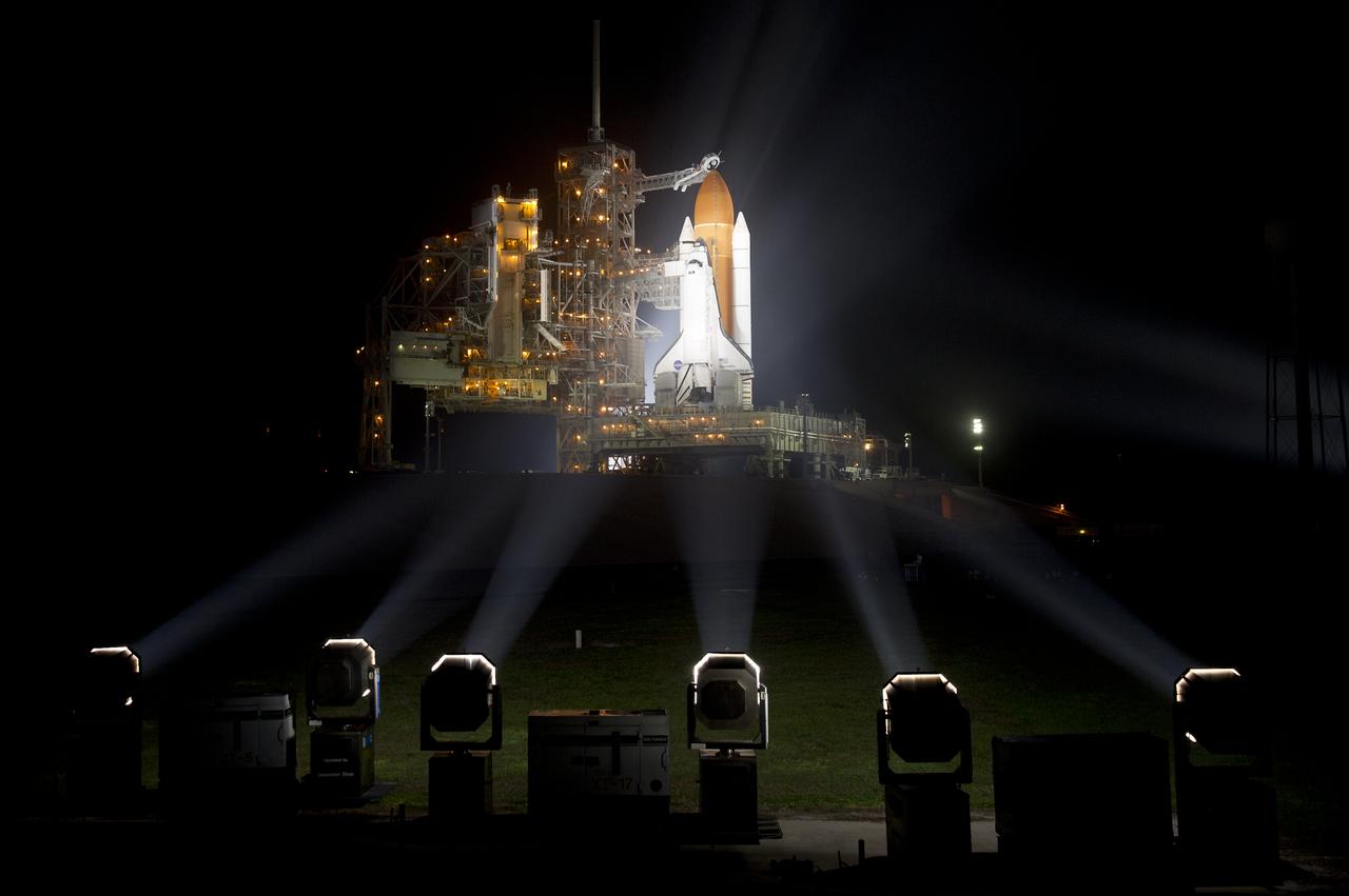The space shuttle Discovery is seen shortly after the Rotating Service Structure was rolled back at launch pad 39A, at the Kennedy Space Center in Cape Canaveral, Florida, on Wednesday, Feb. 23, 2011. Discovery, on its 39th and final flight, will carry the Italian-built Permanent Multipurpose Module (PMM), Express Logistics Carrier 4 (ELC4) and Robonaut 2, the first humanoid robot in space to the International Space Station. Photo Credit: (NASA/Bill Ingalls)